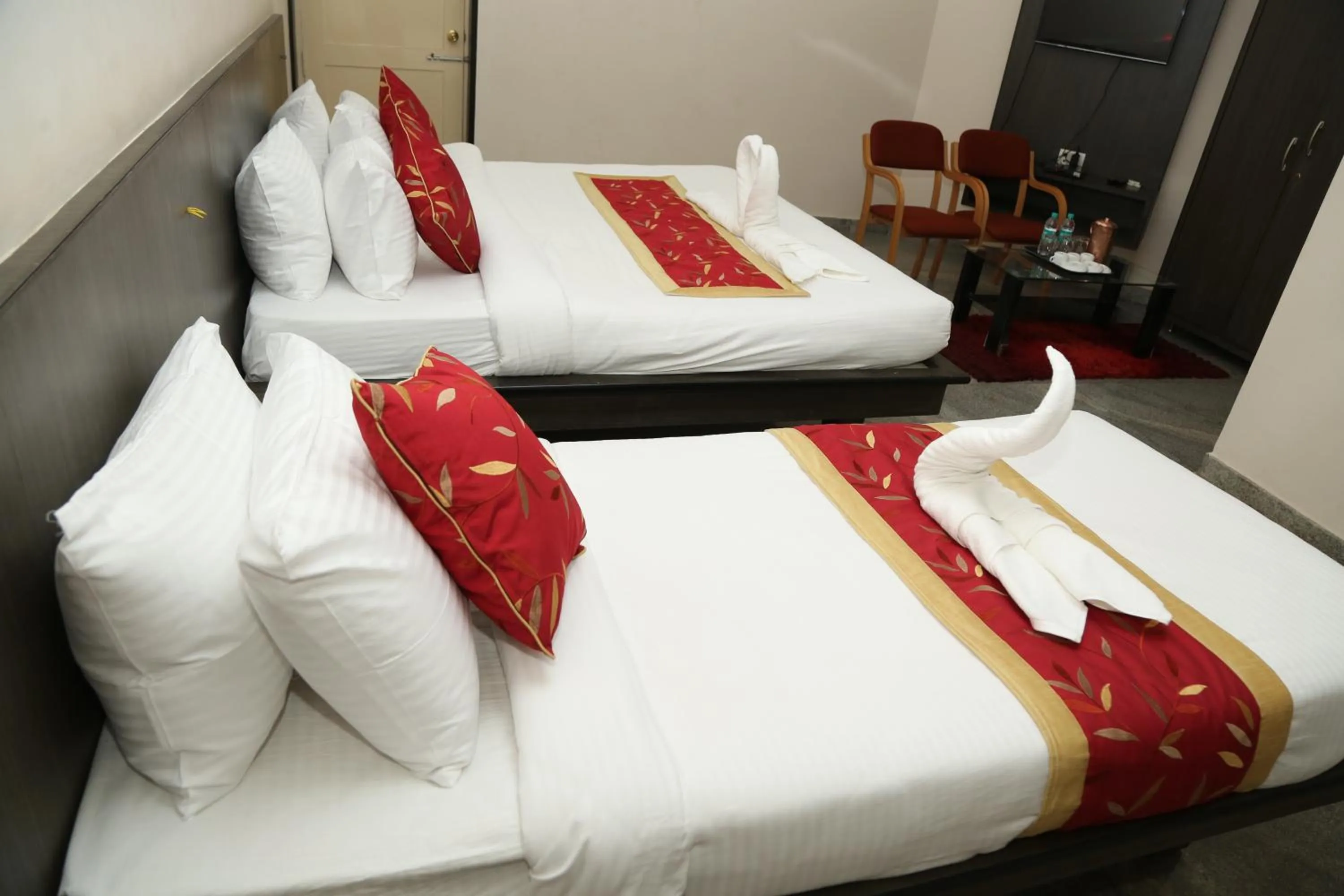 Bed in Soundarya Hotel