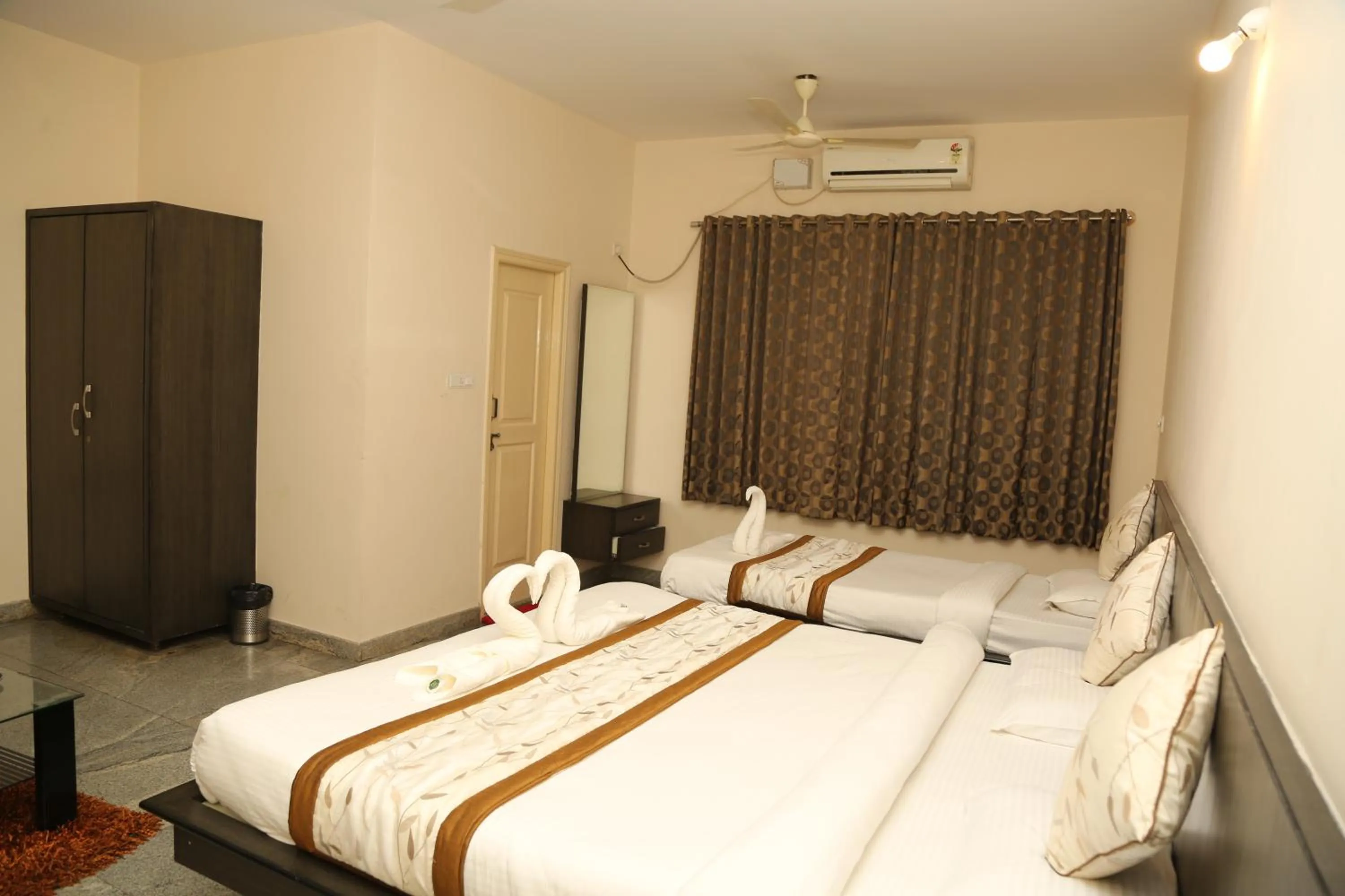 Bed in Soundarya Hotel
