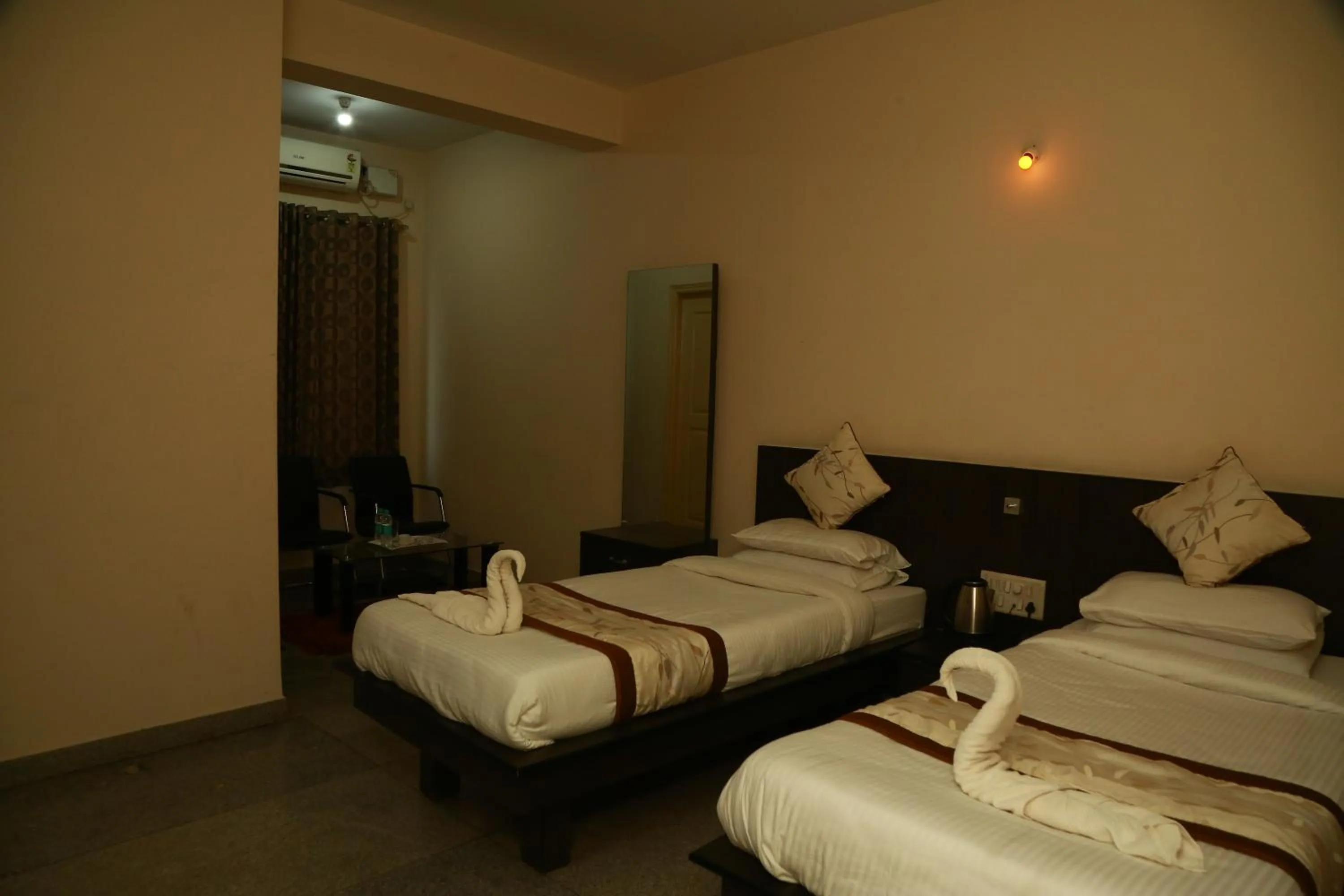 Bed in Soundarya Hotel