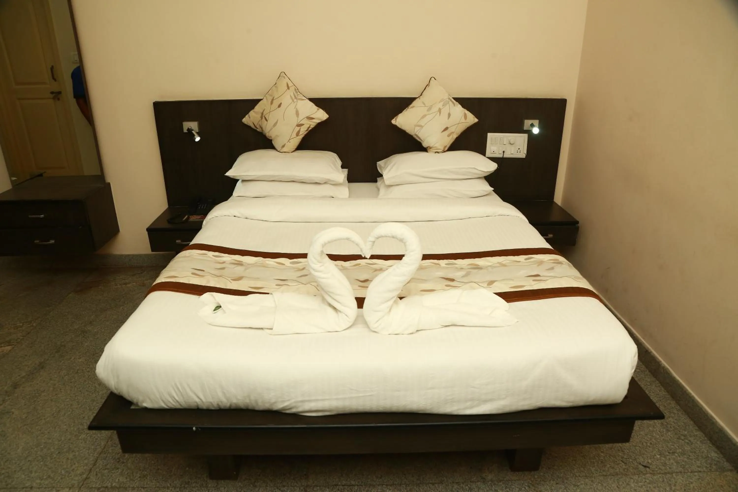 Bed in Soundarya Hotel