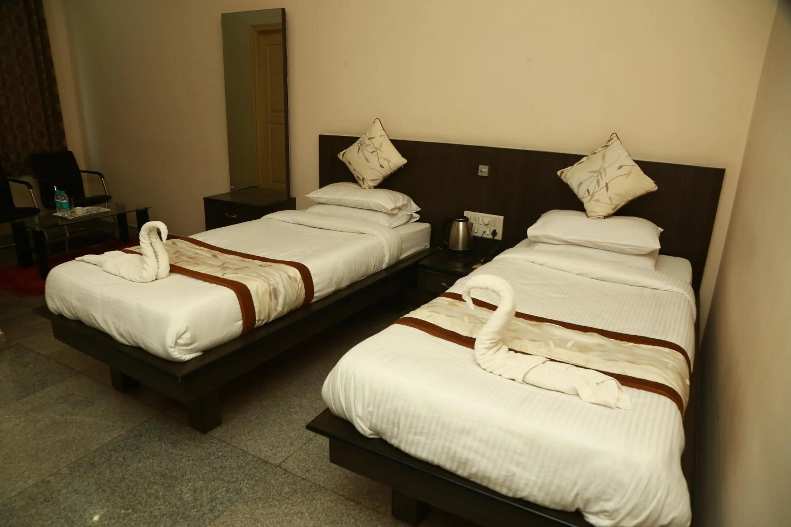 Bed in Soundarya Hotel