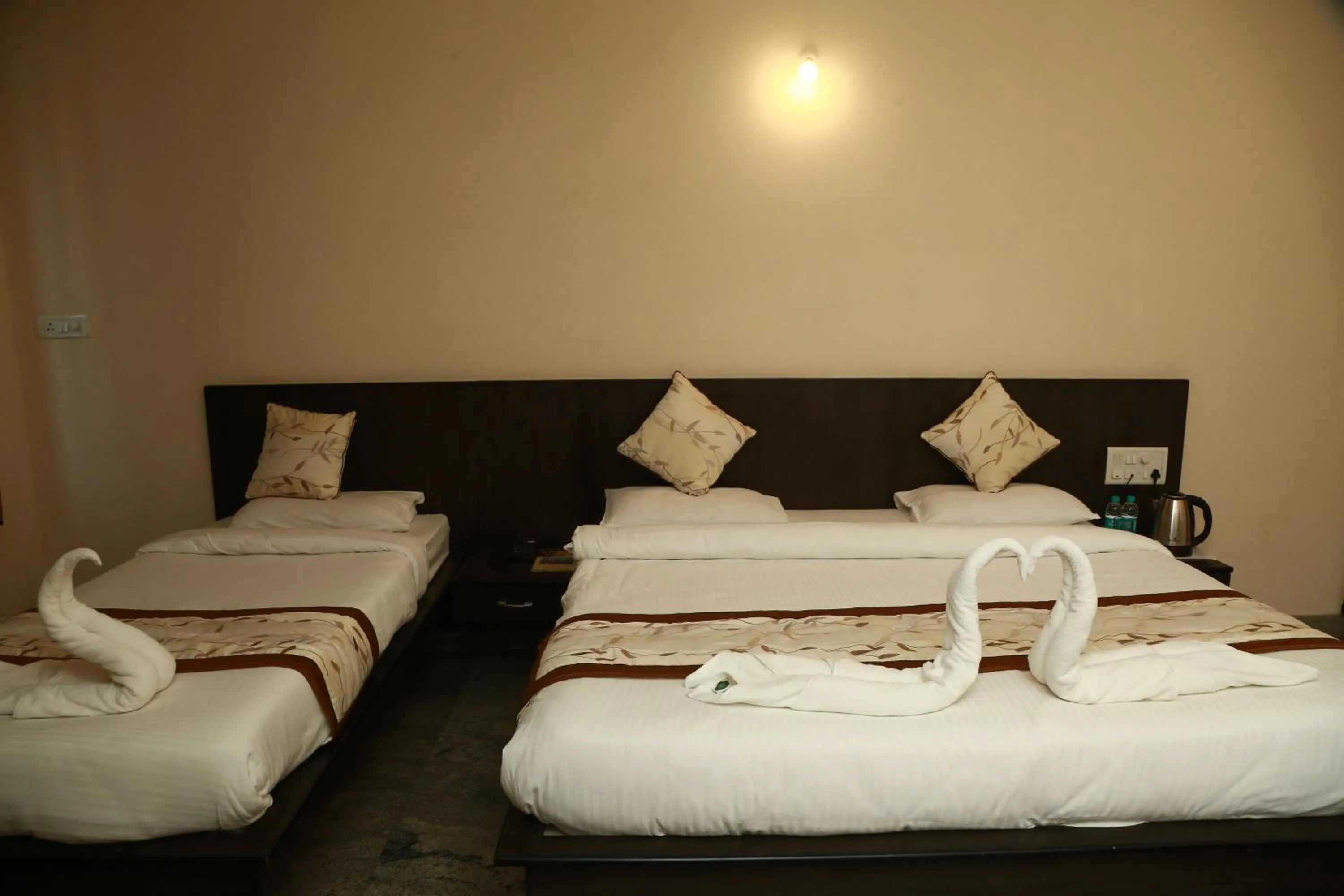 Bed in Soundarya Hotel