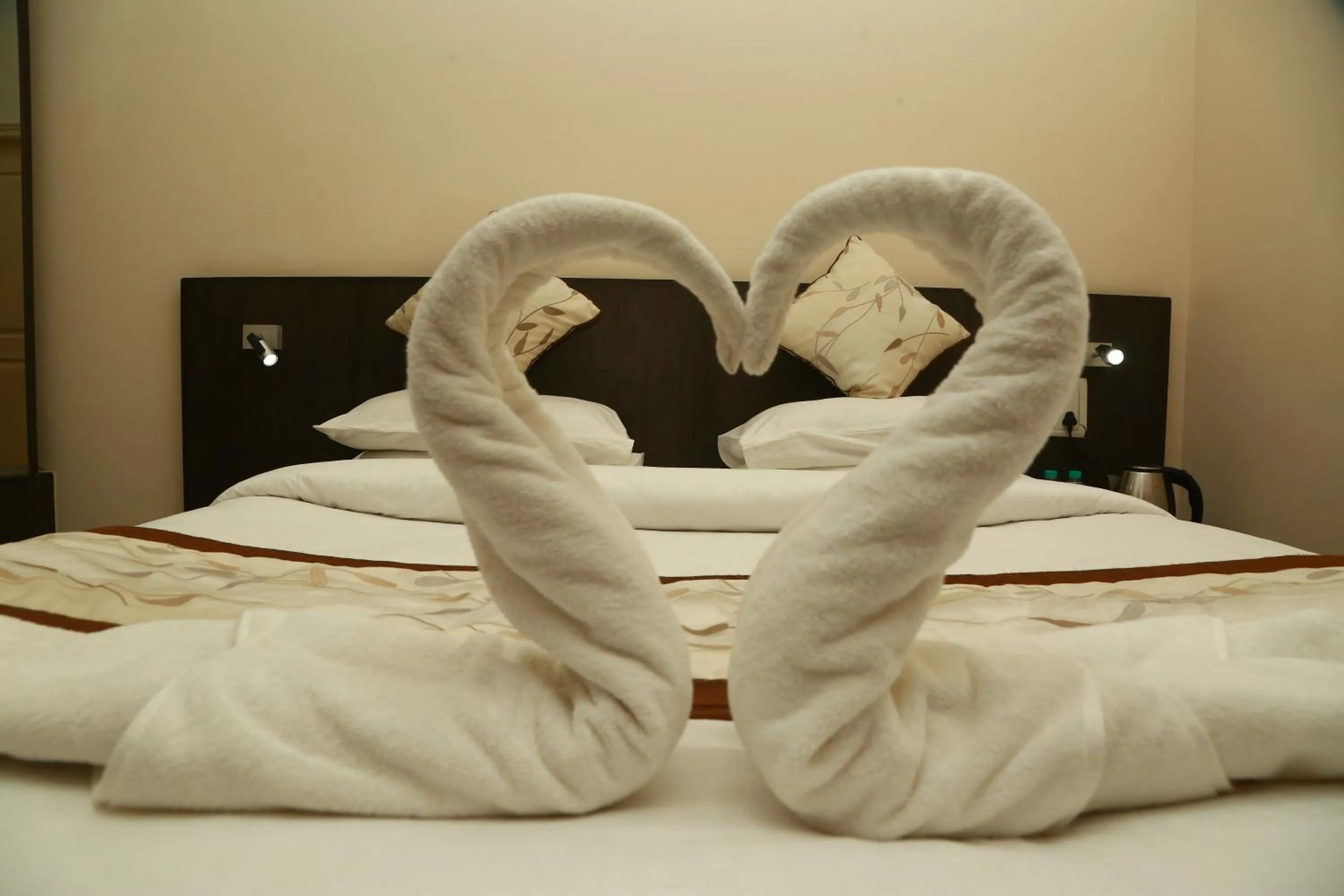 Bed in Soundarya Hotel