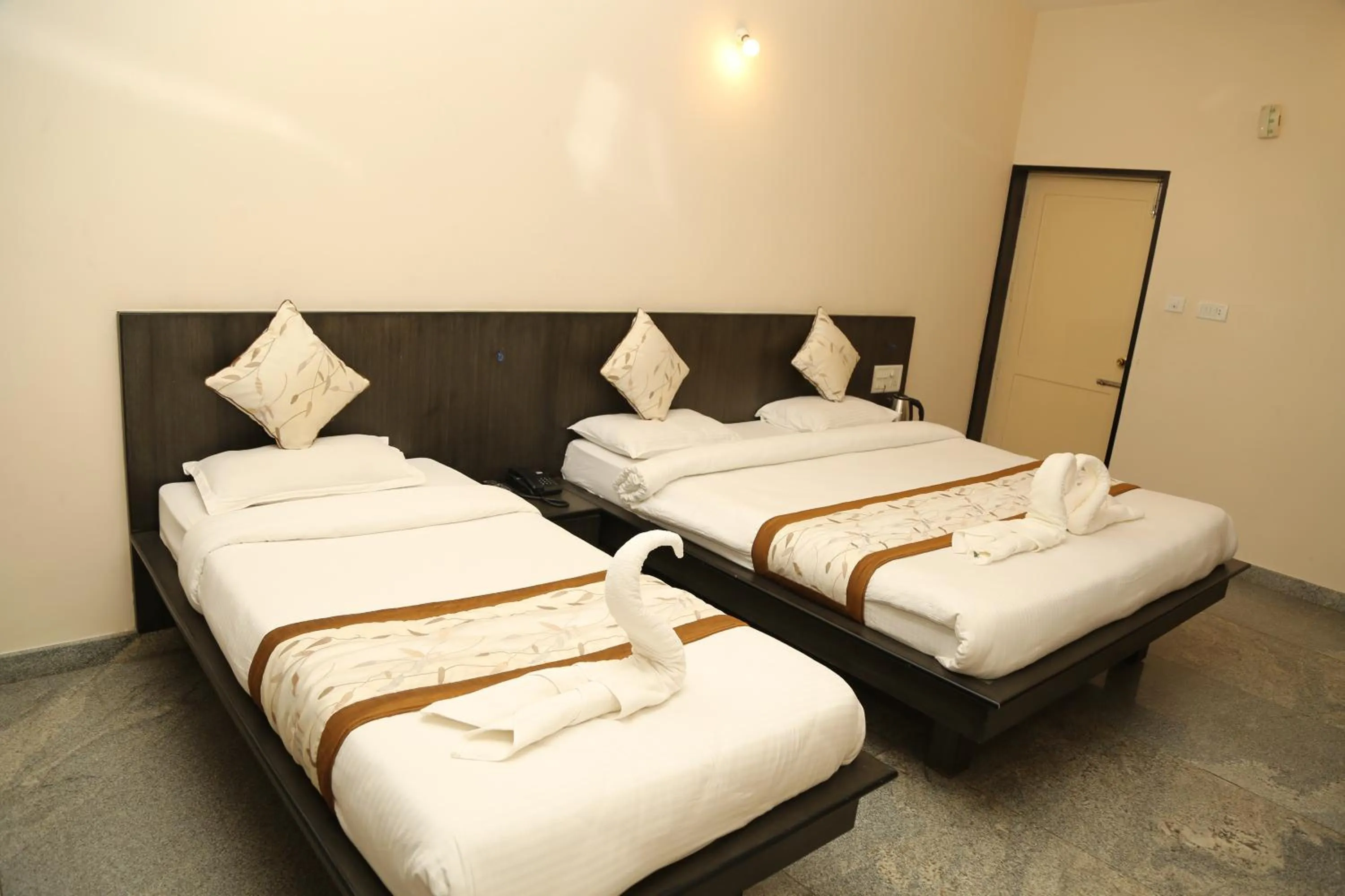 Bed in Soundarya Hotel