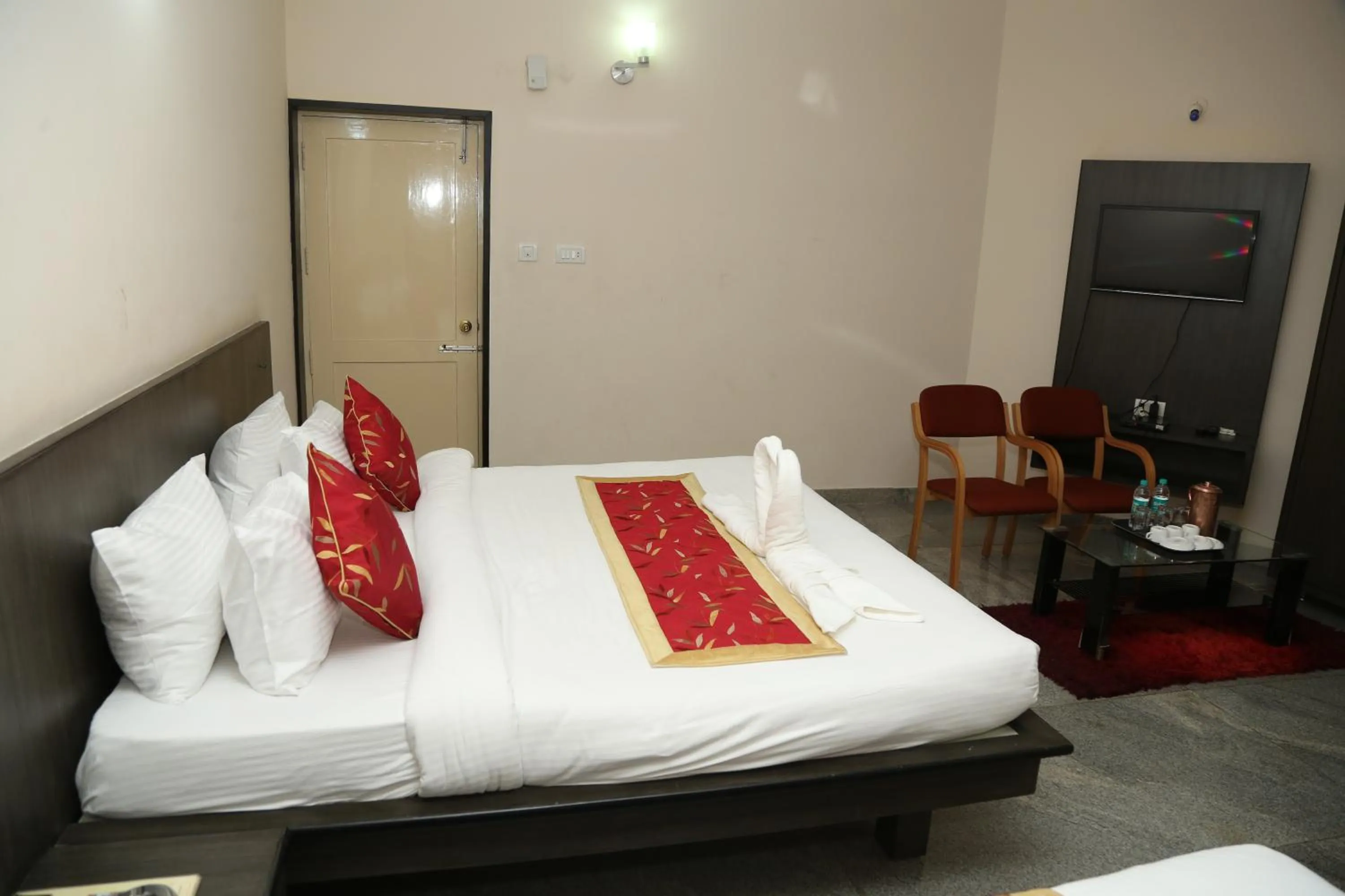 Bed in Soundarya Hotel