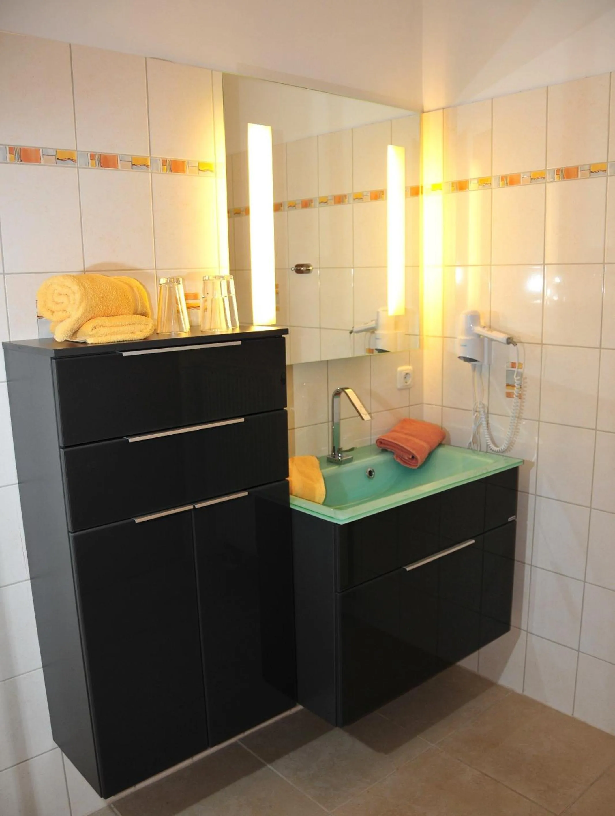 Bathroom in Landhaus Hammoor Stieper Gastronomie GmbH