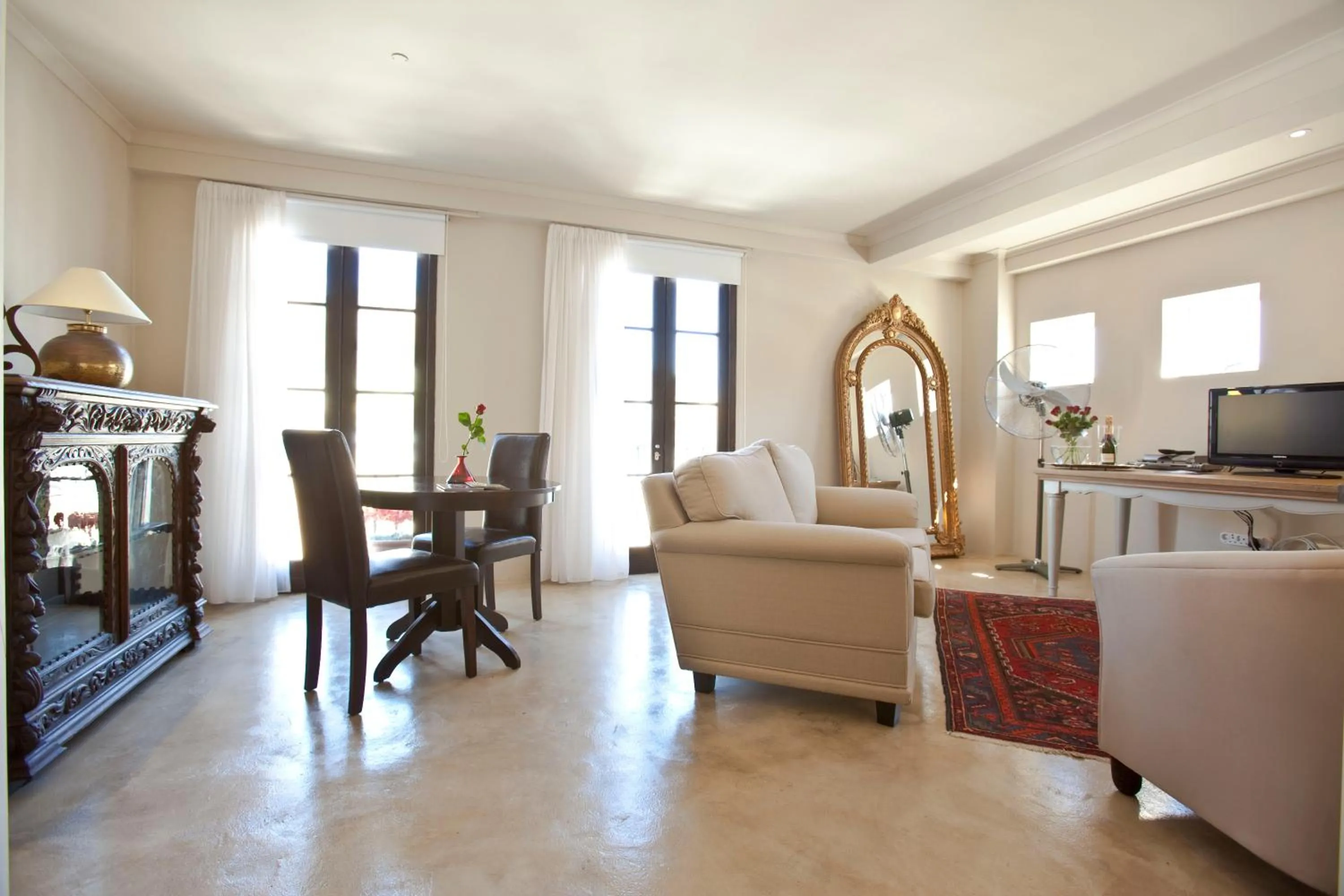 Seating area in Rouge on Rose Boutique Hotel