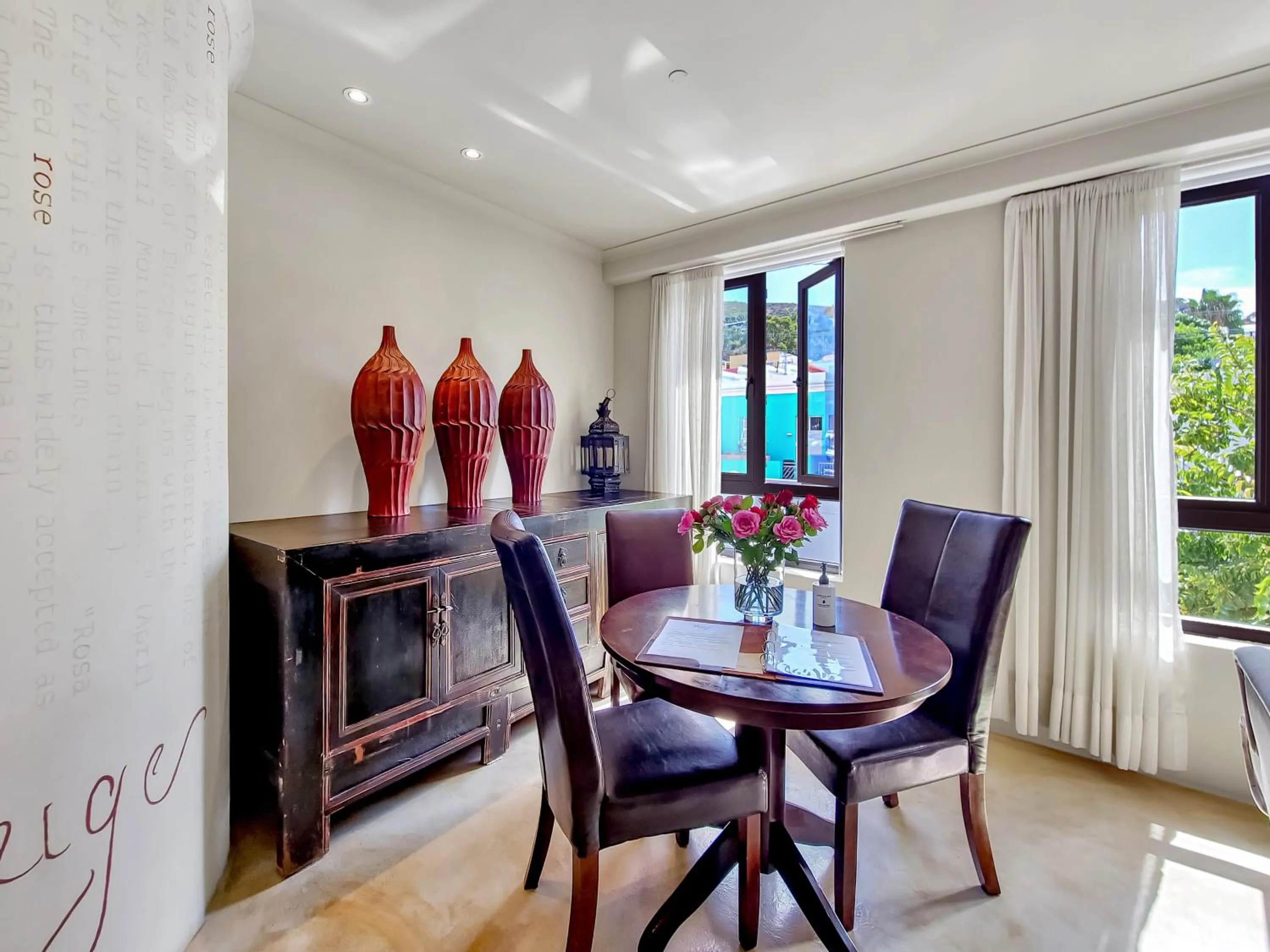 Seating area in Rouge on Rose Boutique Hotel