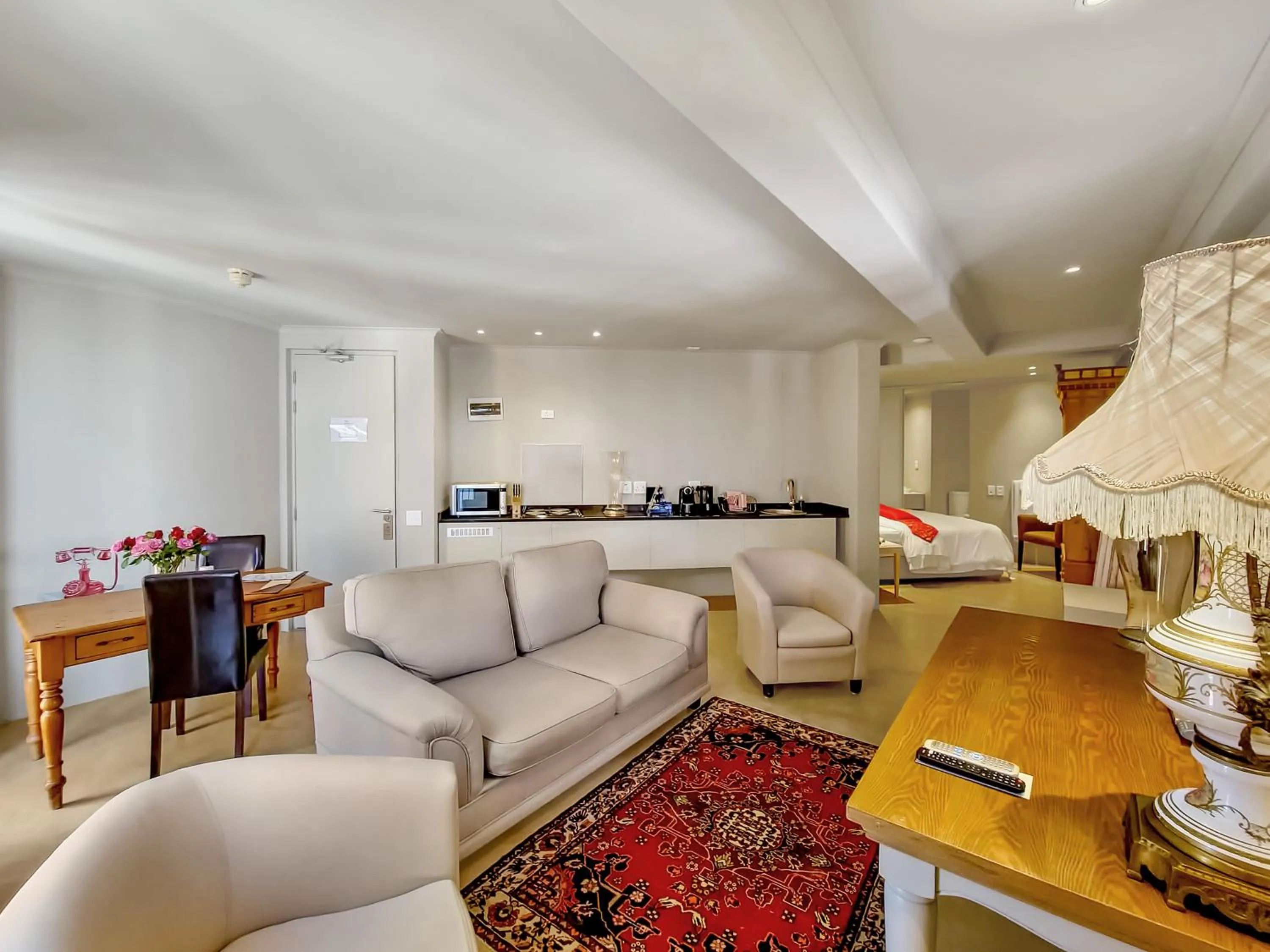 Kitchen or kitchenette in Rouge on Rose Boutique Hotel