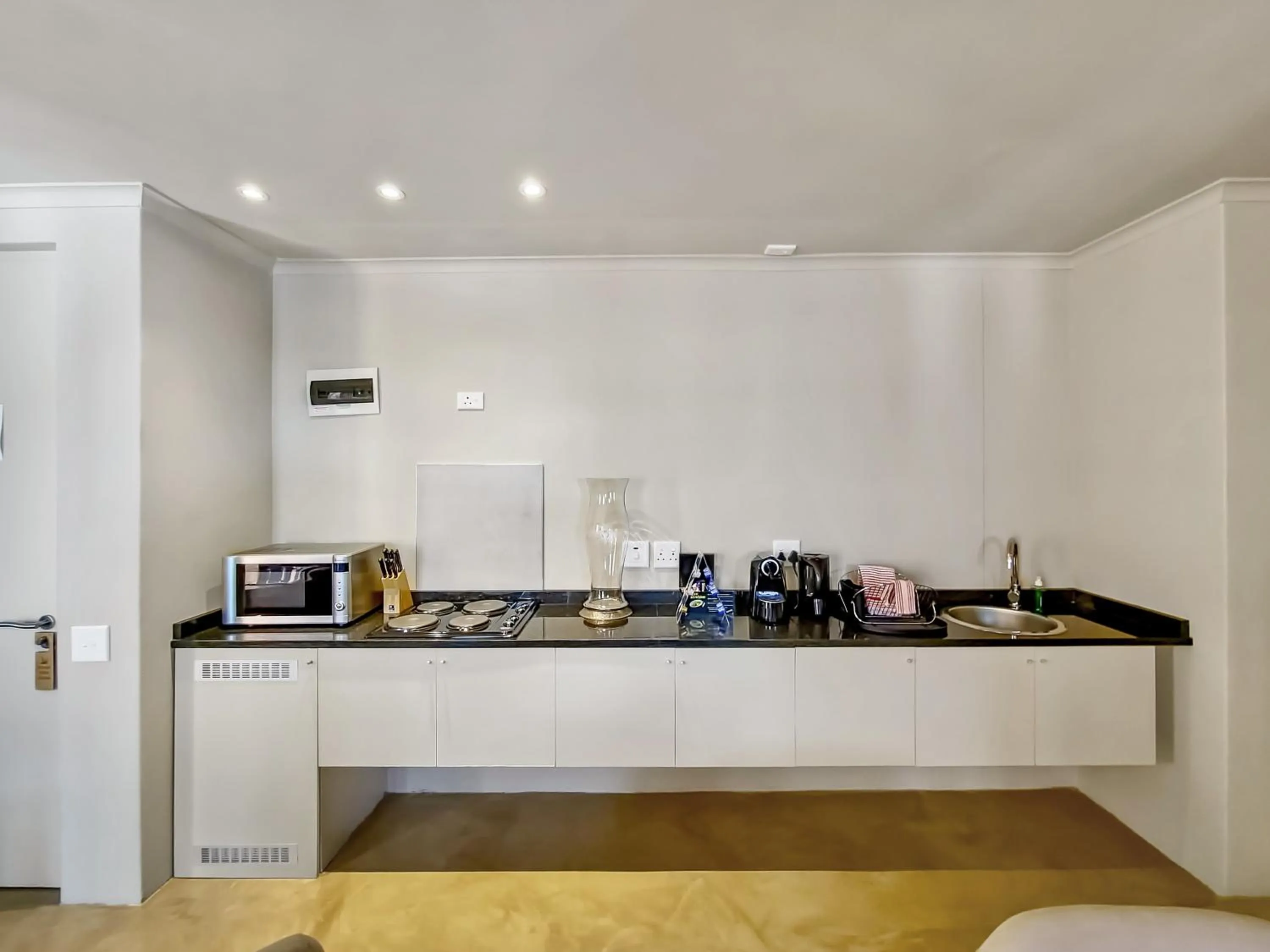 Kitchen or kitchenette in Rouge on Rose Boutique Hotel