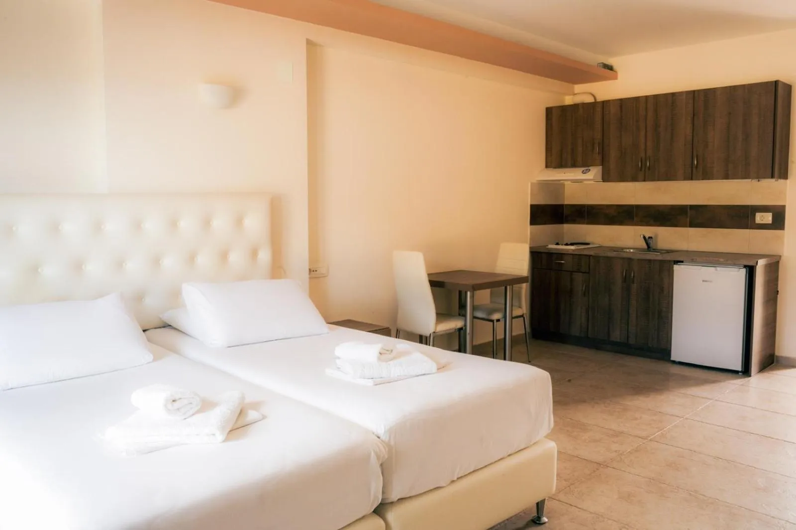 Property building, Bed in Coralli Hotel