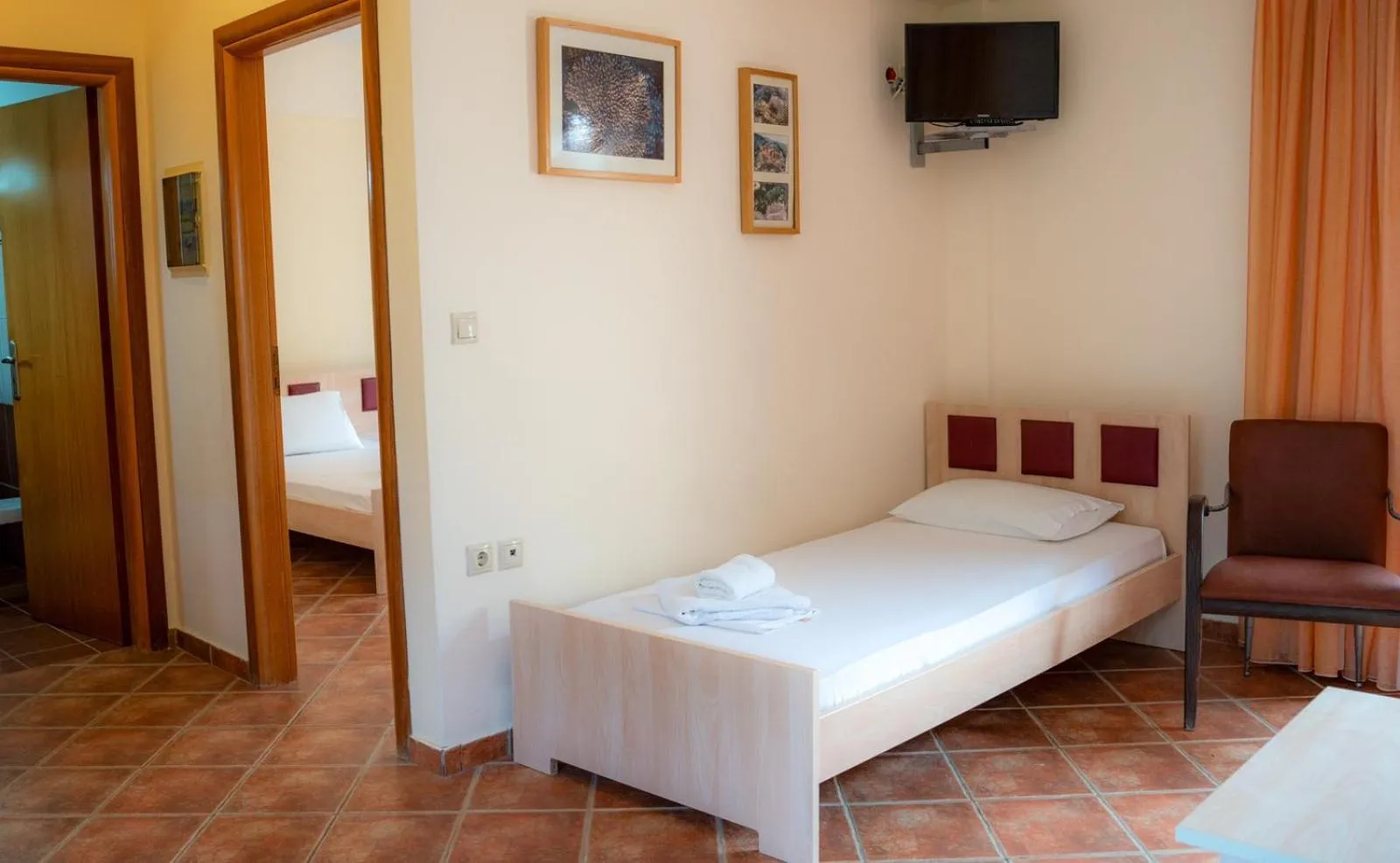 Property building, Bed in Coralli Hotel