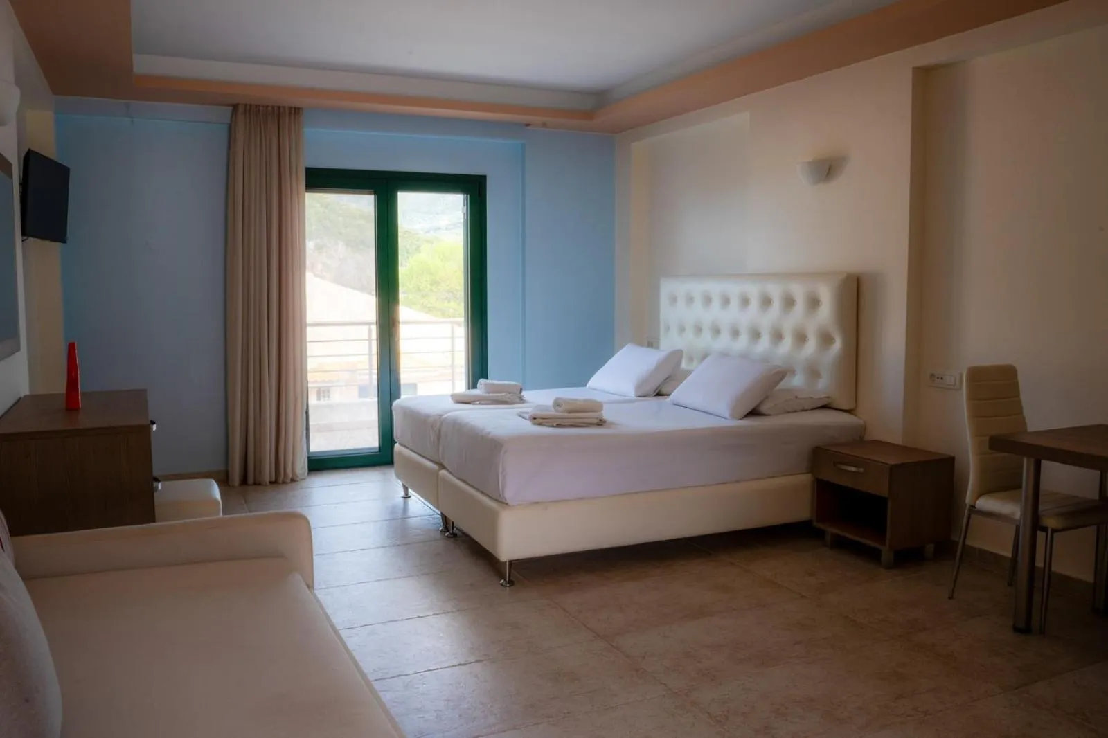 Property building, Bed in Coralli Hotel