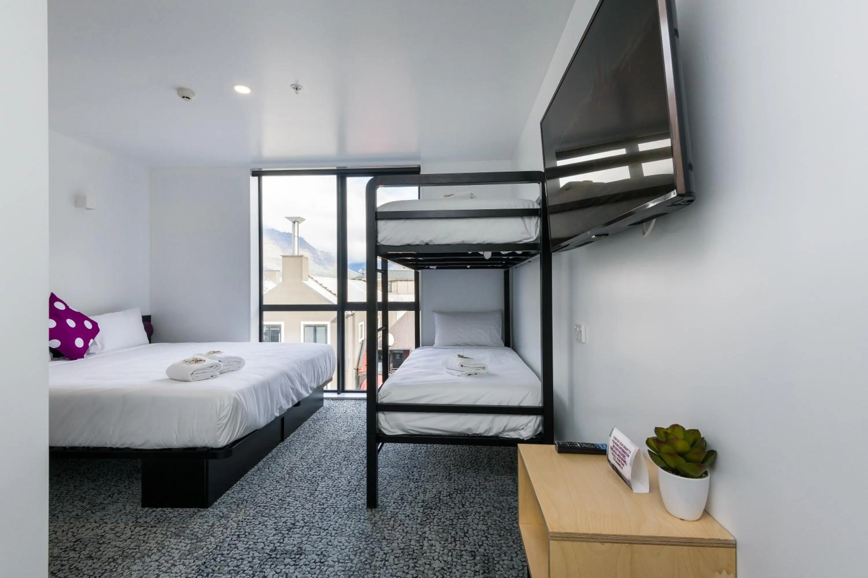 Bed in Jucy Snooze Queenstown