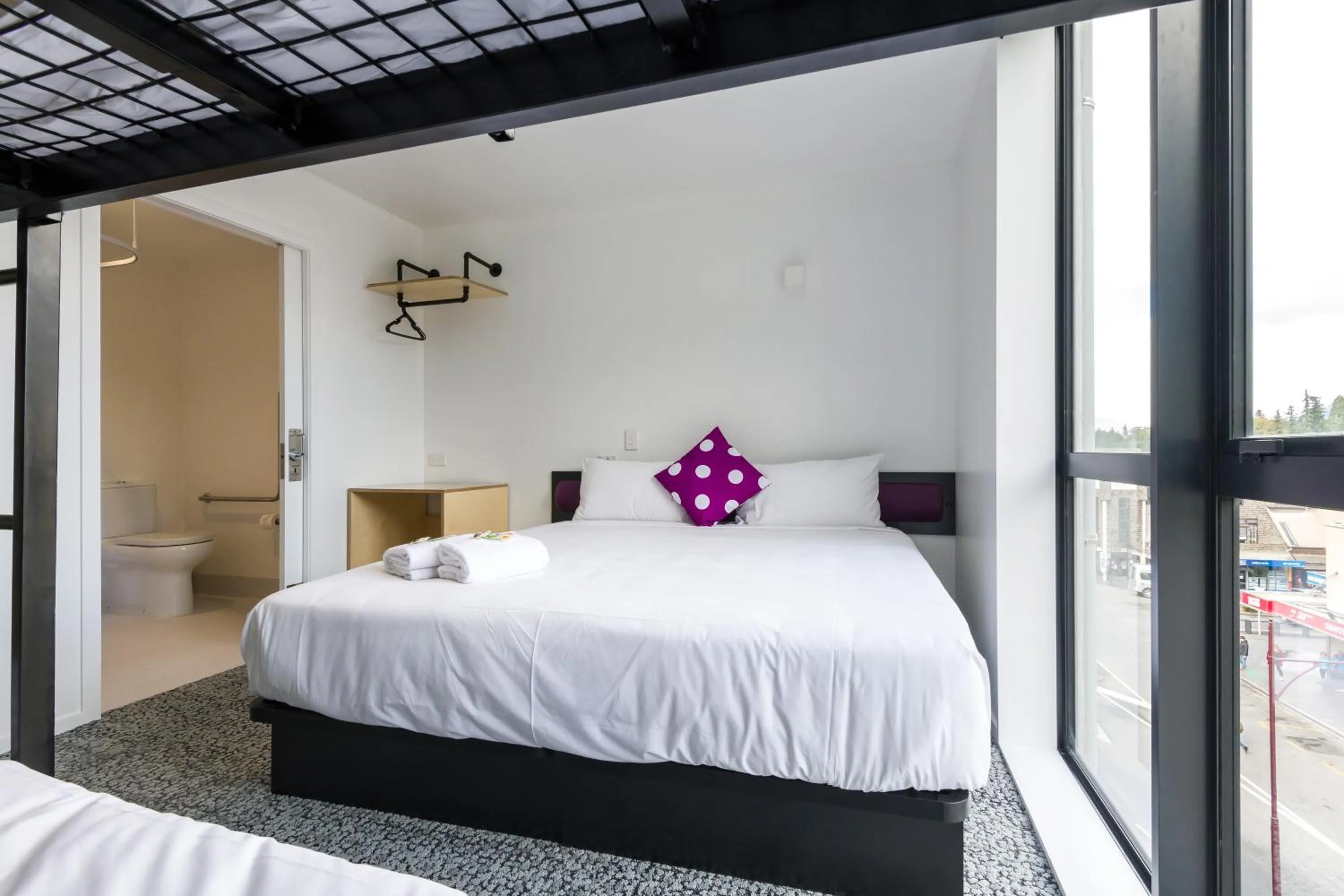 Bed in Jucy Snooze Queenstown