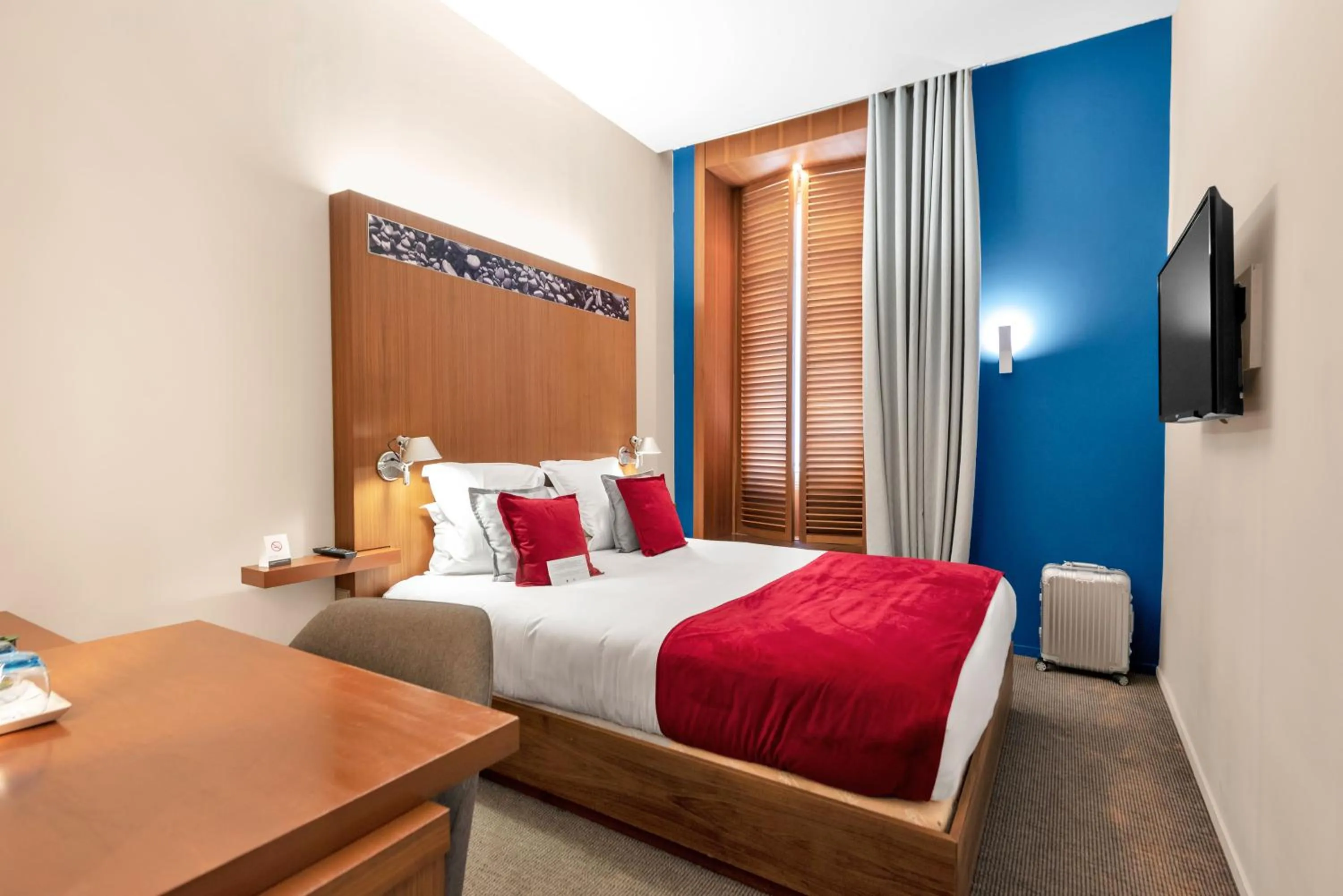 Bed in Hotel Beau Rivage