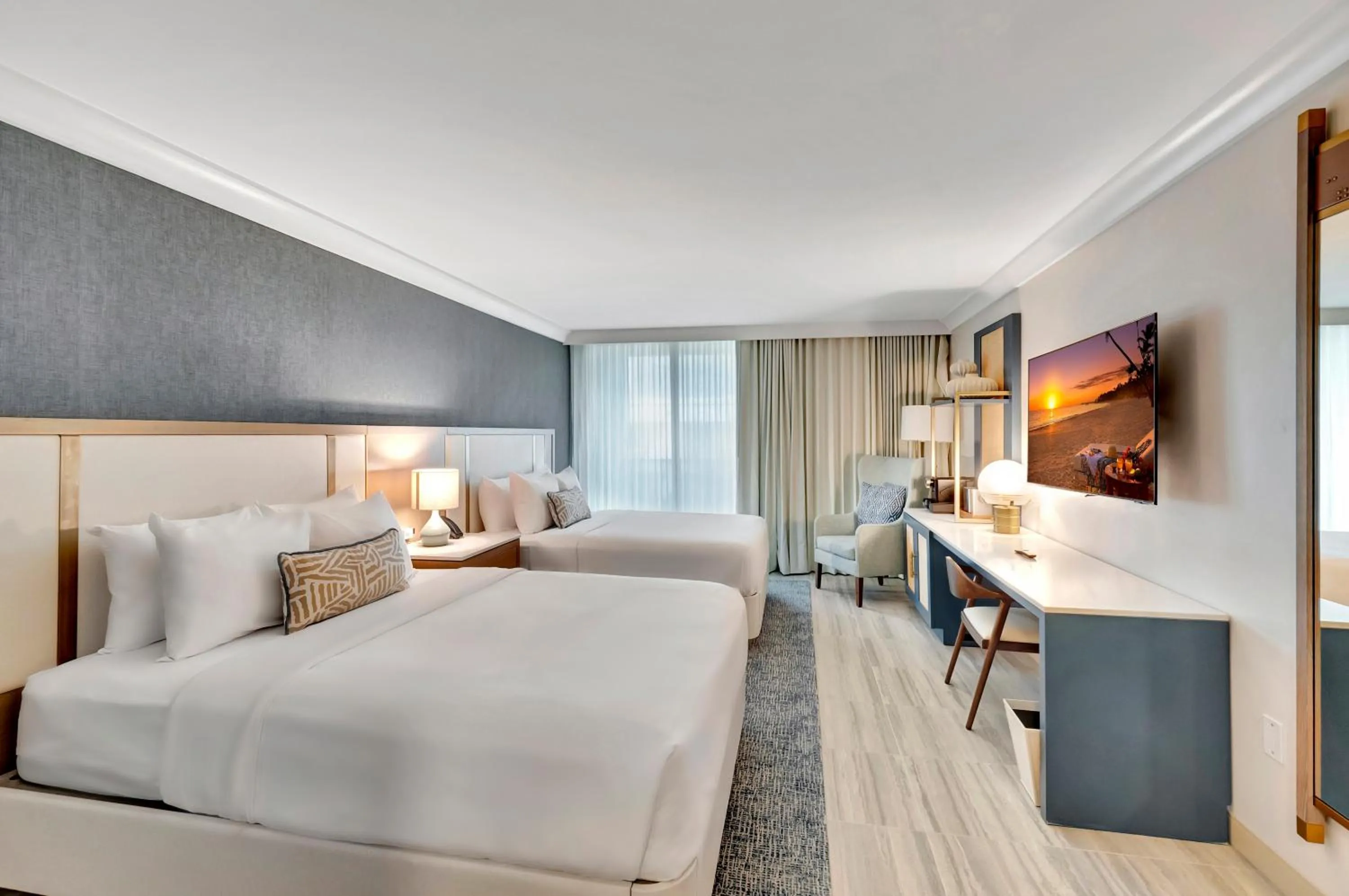 Bed in Tideline Palm Beach Ocean Resort and Spa