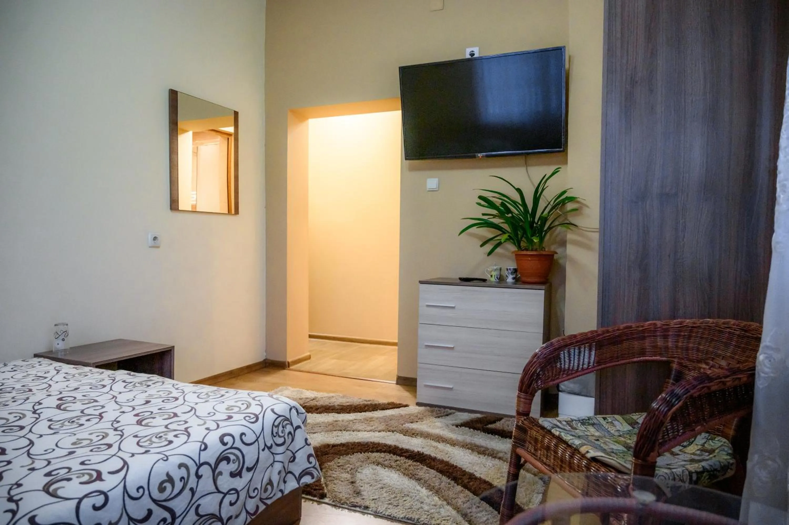 Communal lounge/ TV room, Bed in Guest House Angelkovi