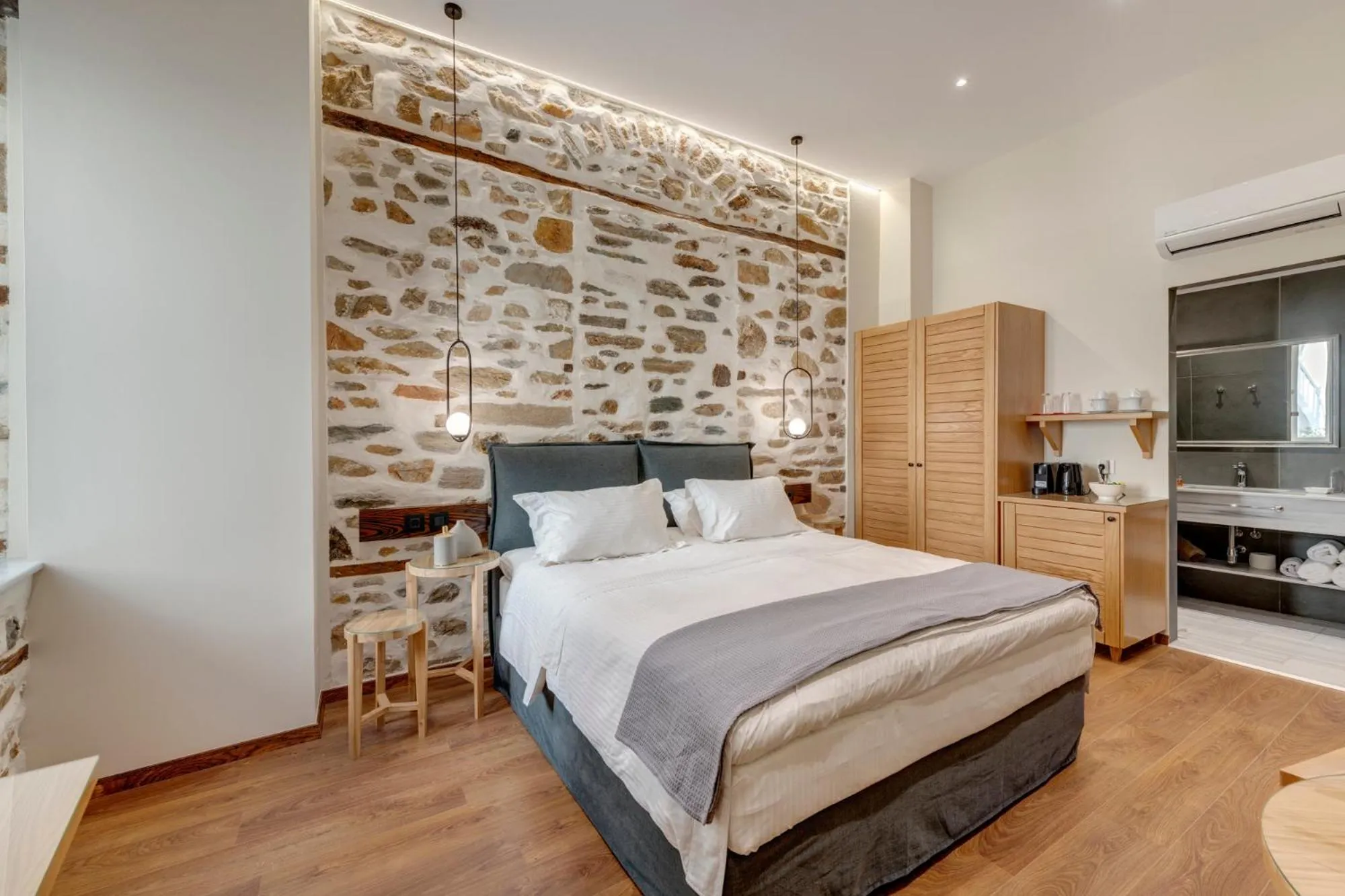 Photo of the whole room, Bed in 1844 Suites Syros