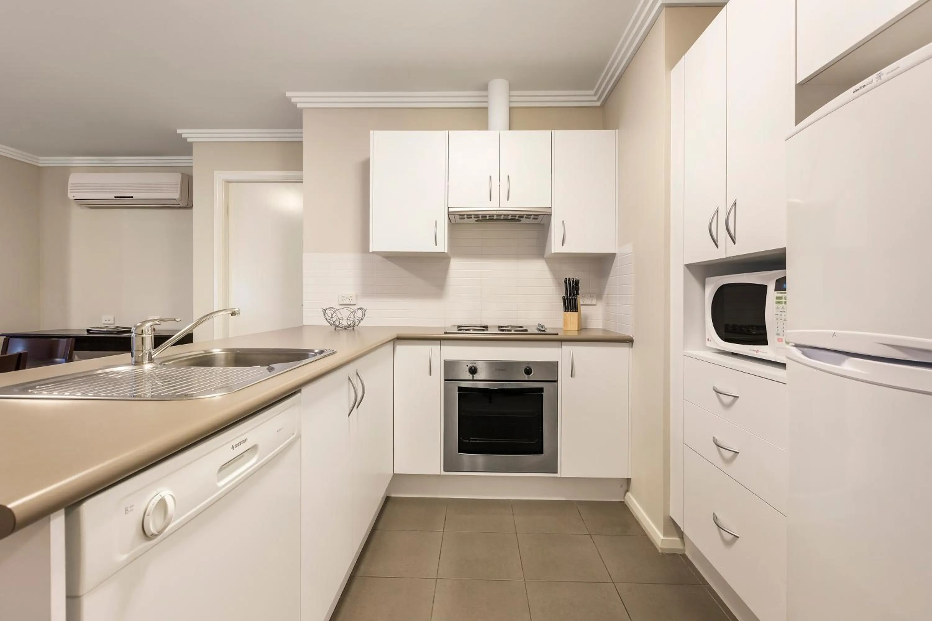 Kitchen or kitchenette in Quest Wollongong