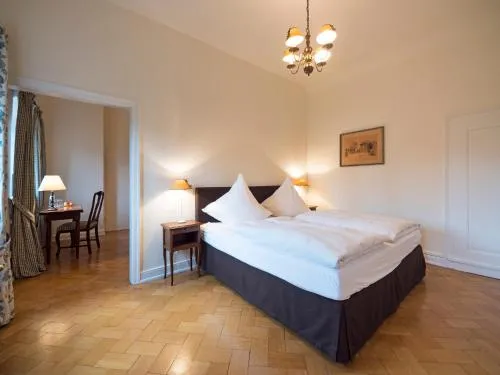 Bed in Gästehaus Schloss Saareck