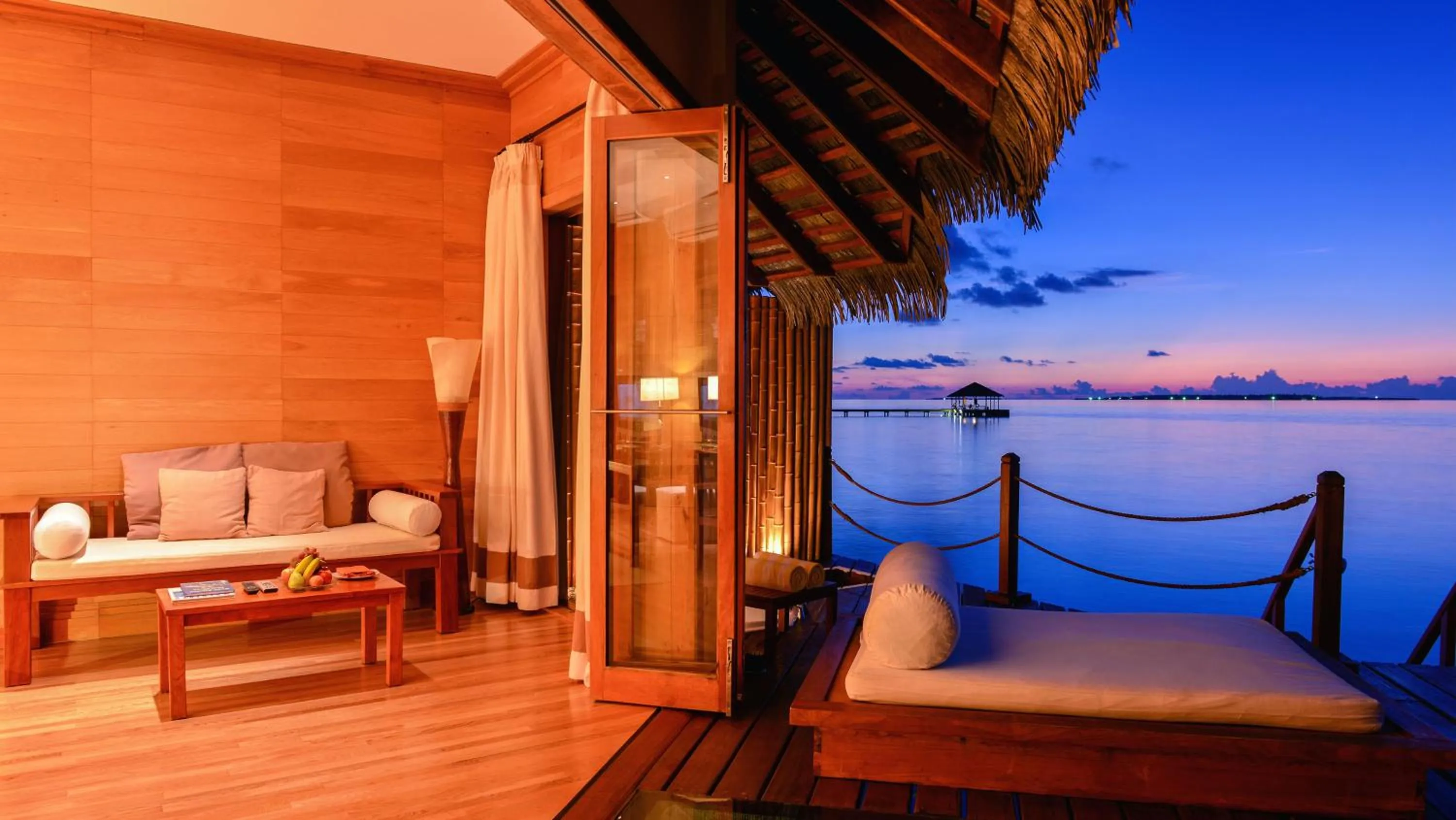 Seating area in Adaaran Prestige Water Villas - with Dine around Premium All inclusive - 24 hours