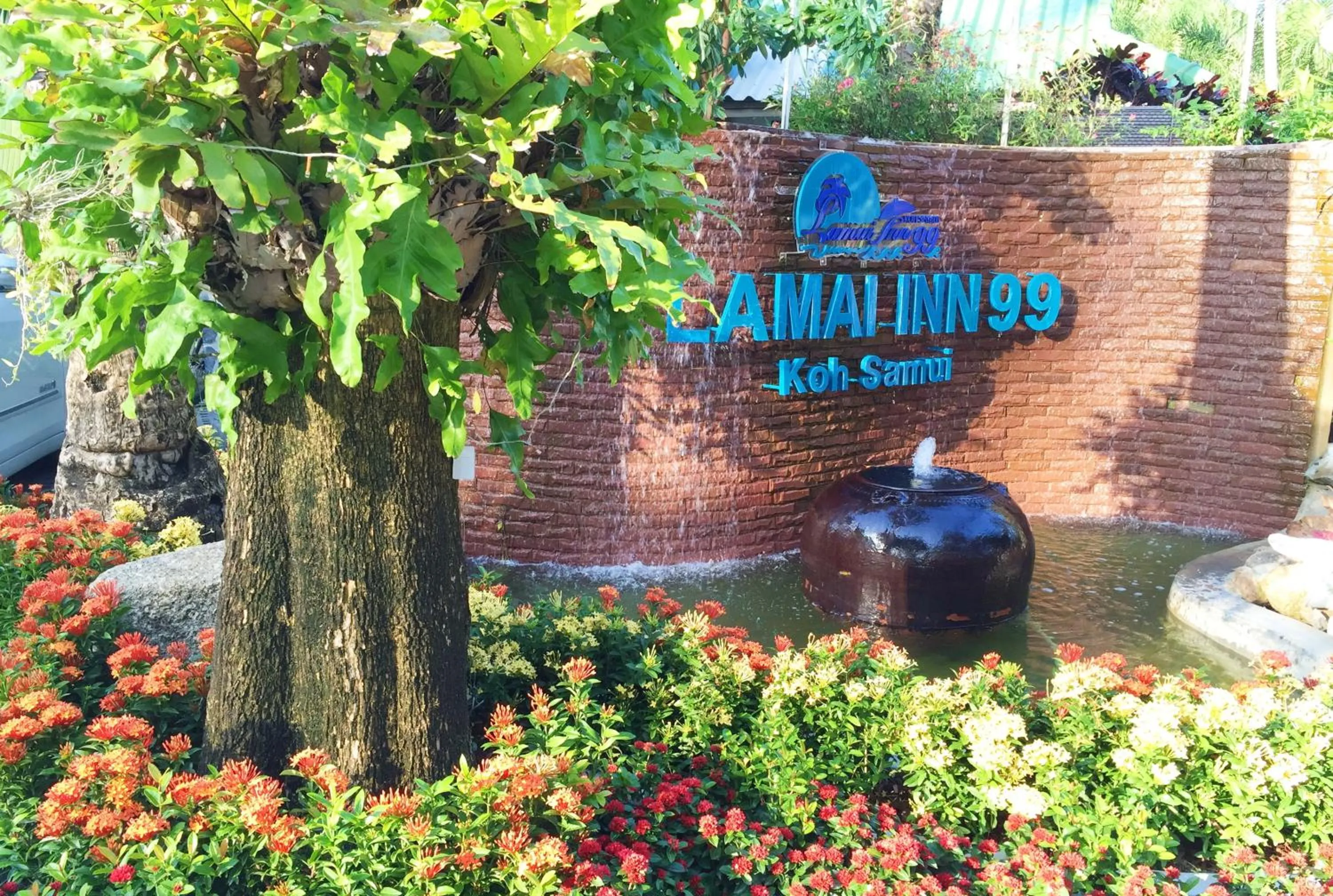 Property logo or sign in Lamai Inn 99 Bungalows