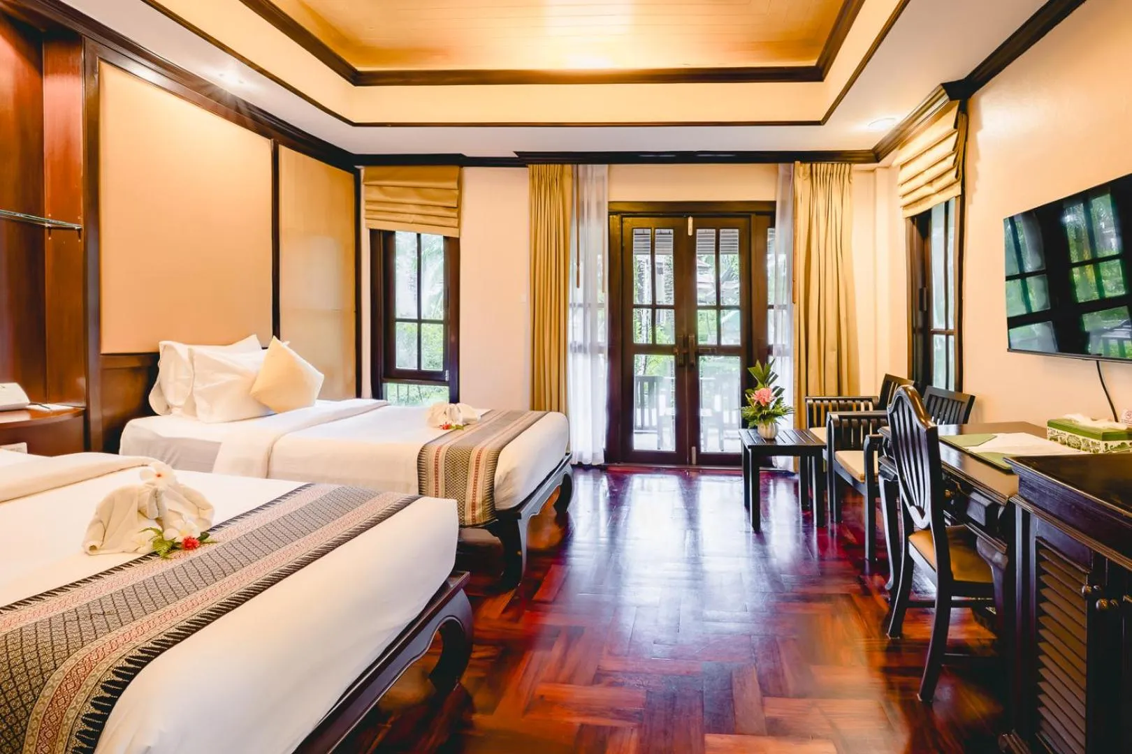 Bed in Khaolak Palm Beach Resort