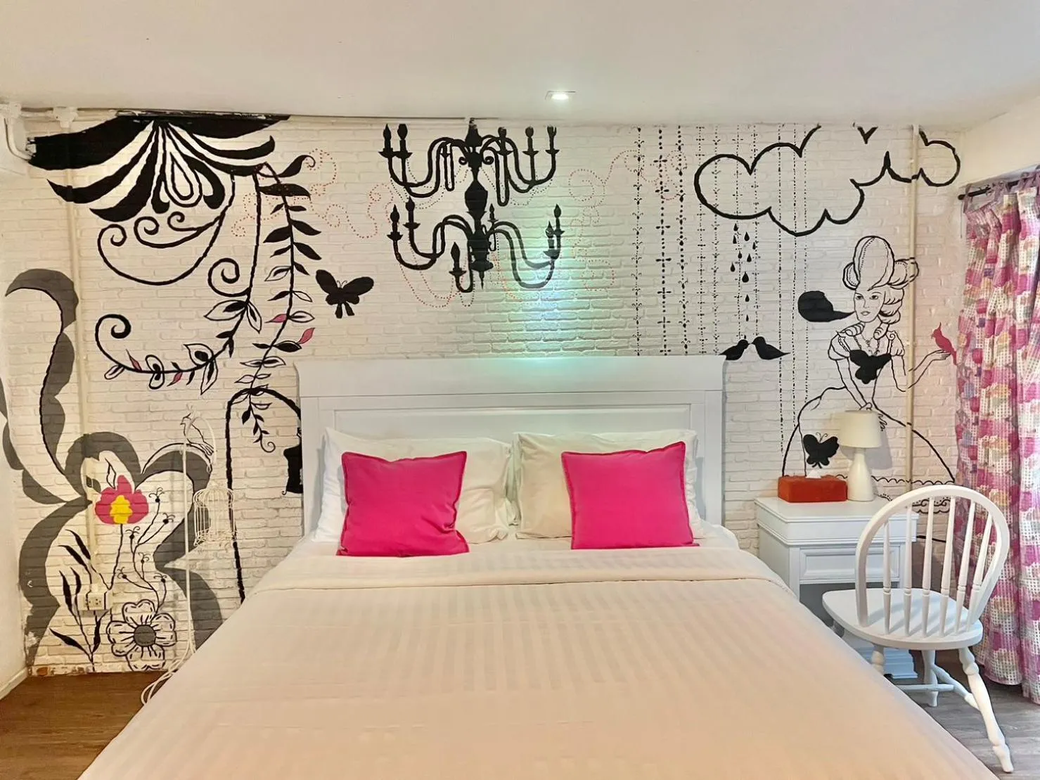 Bed in Green Gallery Beach Boutique Hotel