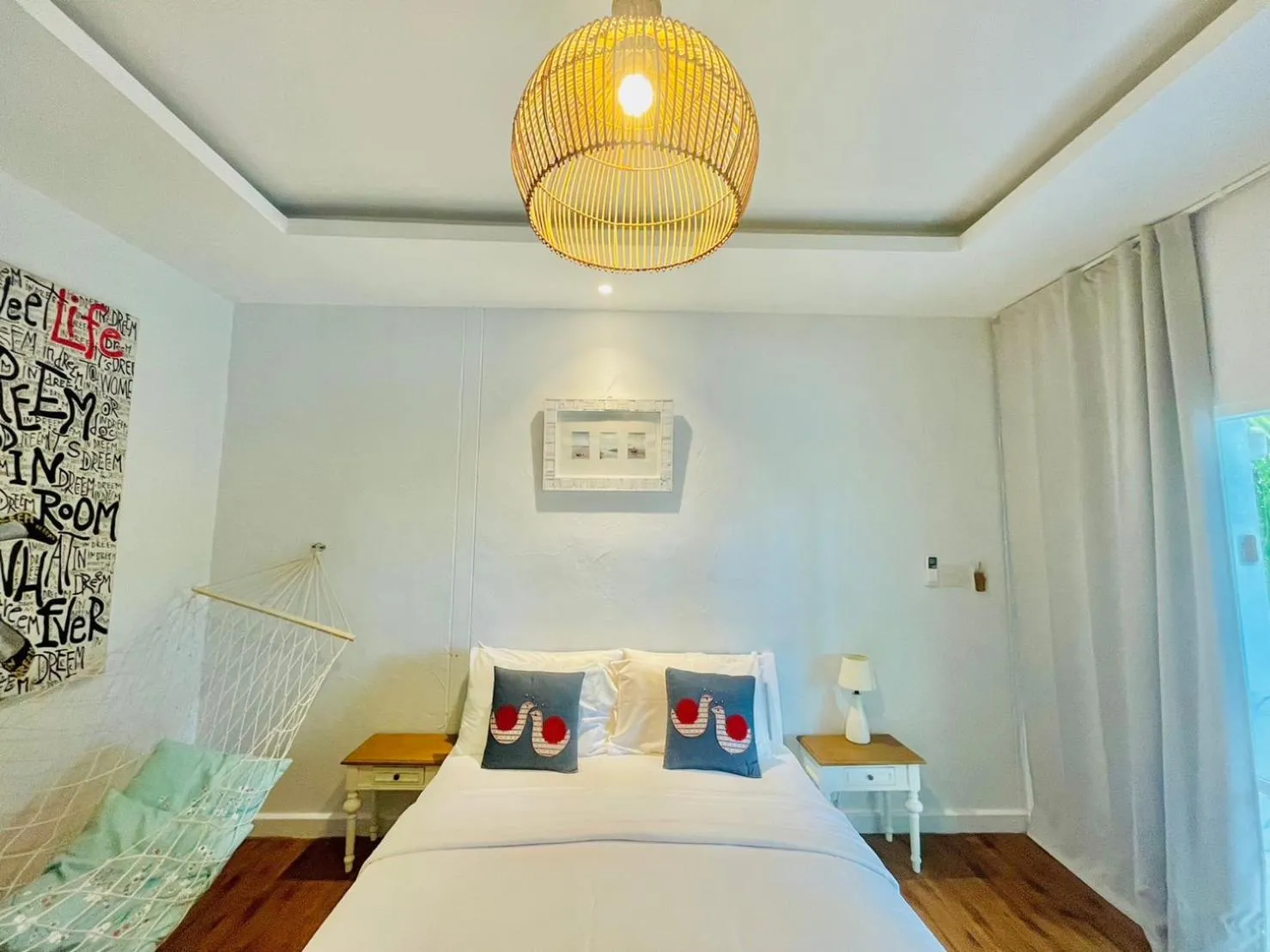 Bed in Green Gallery Beach Boutique Hotel