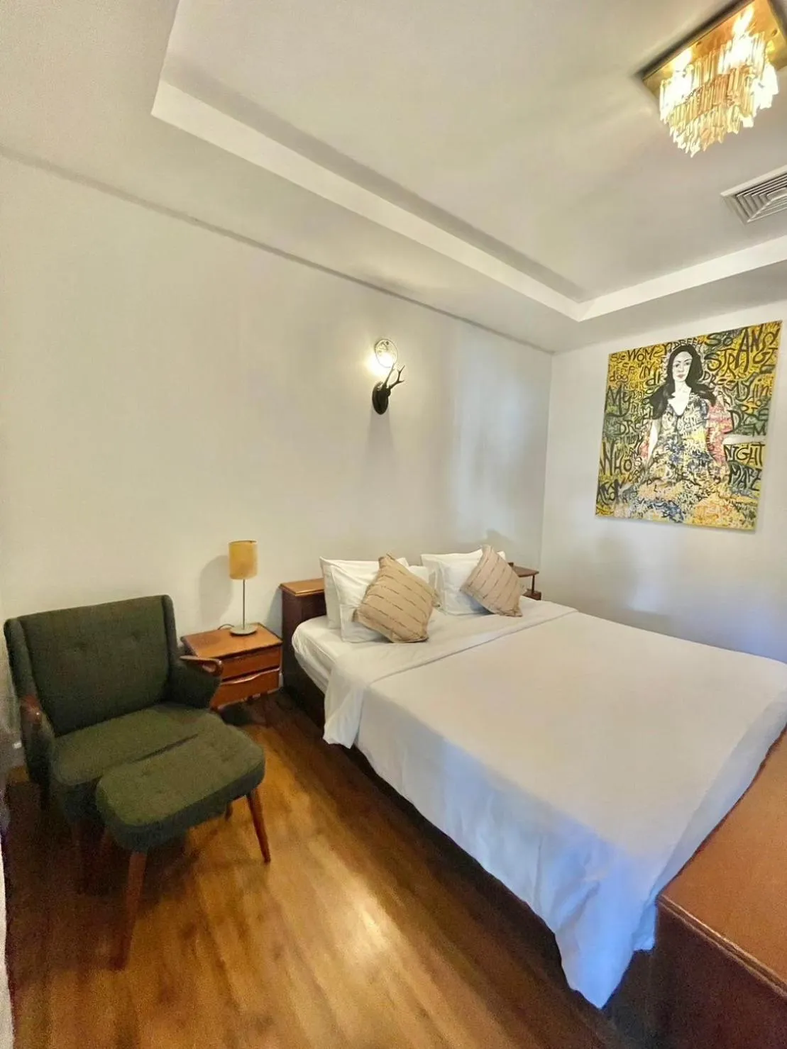 Bed in Green Gallery Beach Boutique Hotel