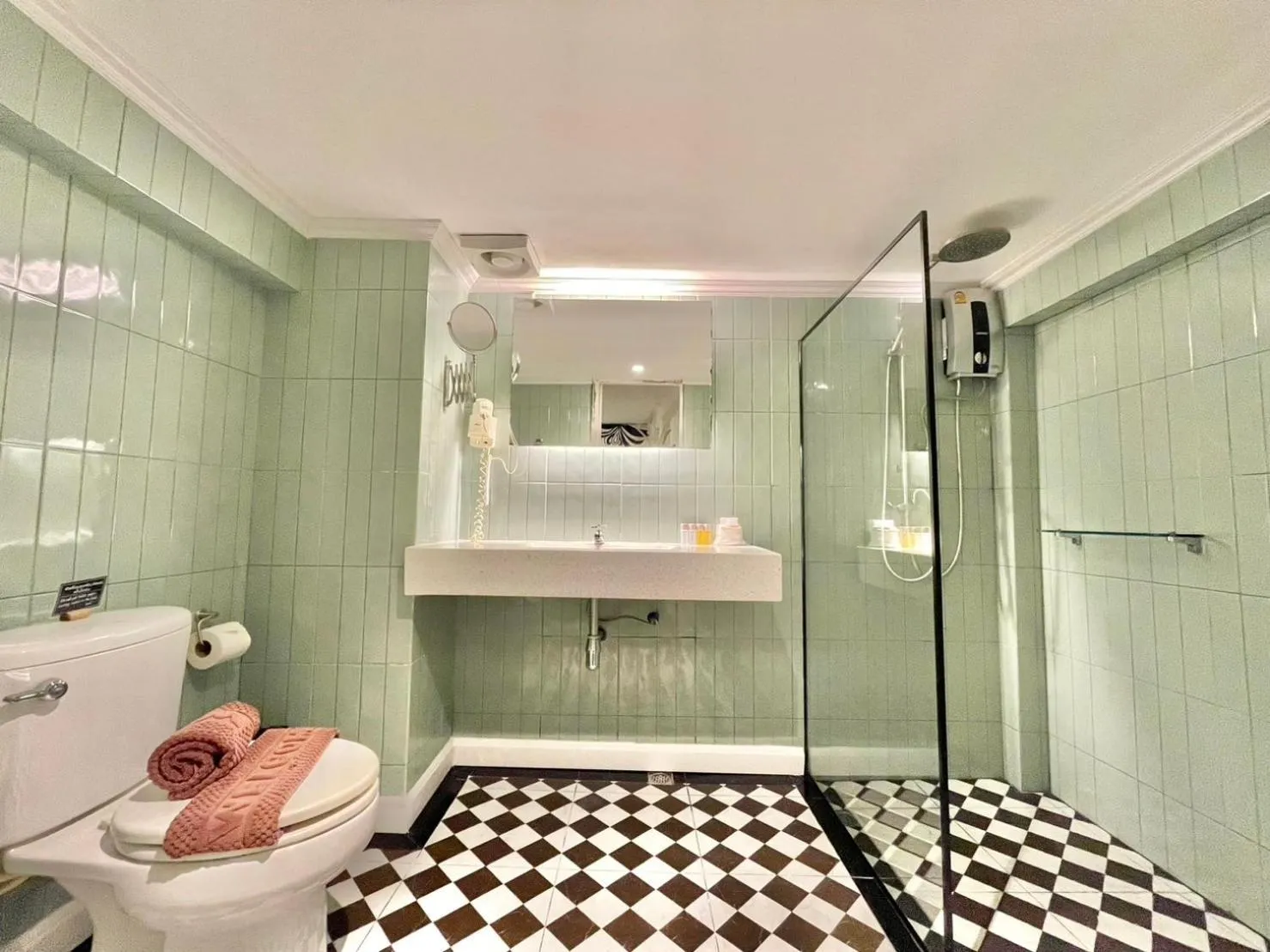 Bed in Green Gallery Beach Boutique Hotel