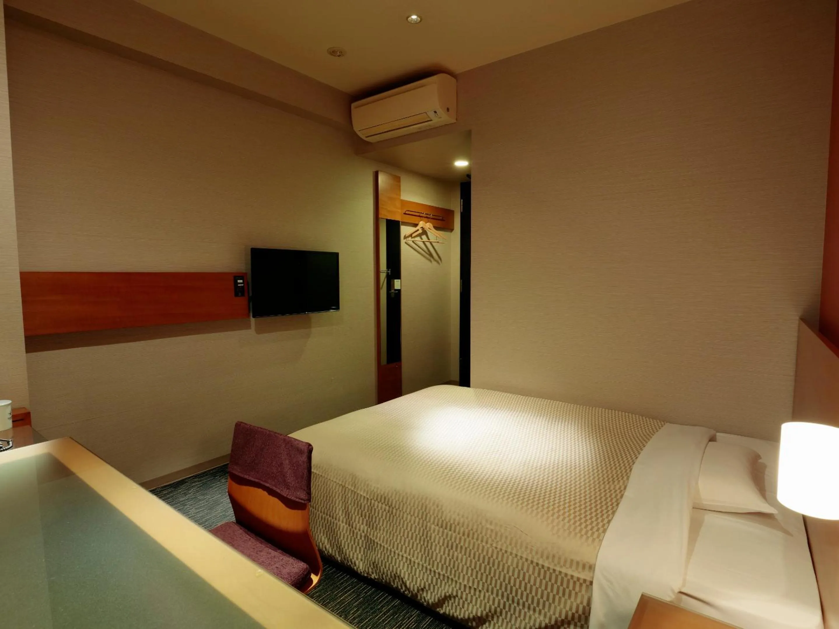 Bed in Candeo Hotels Sano