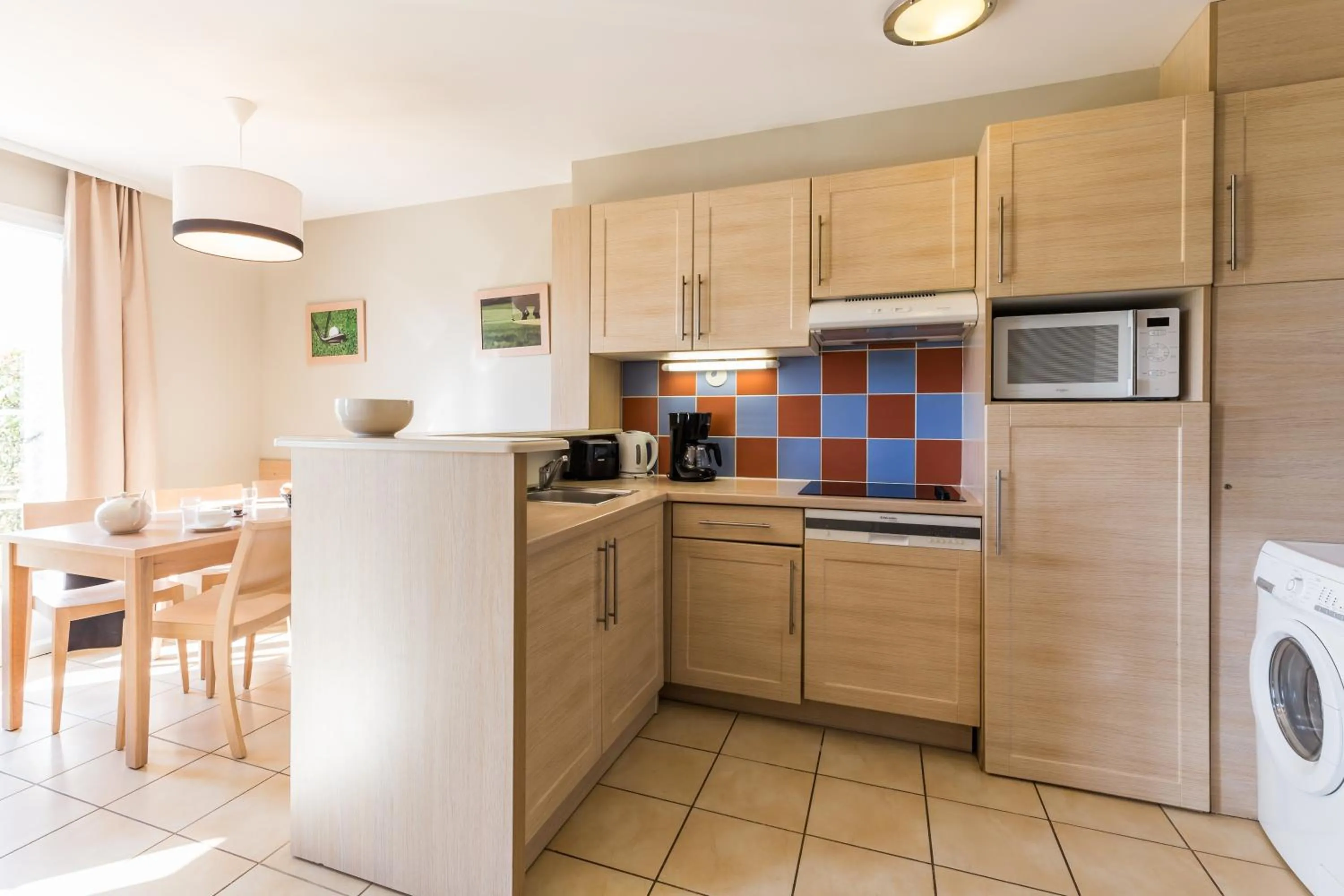 Kitchen or kitchenette in Résidence Pierre & Vacances le Green Beach