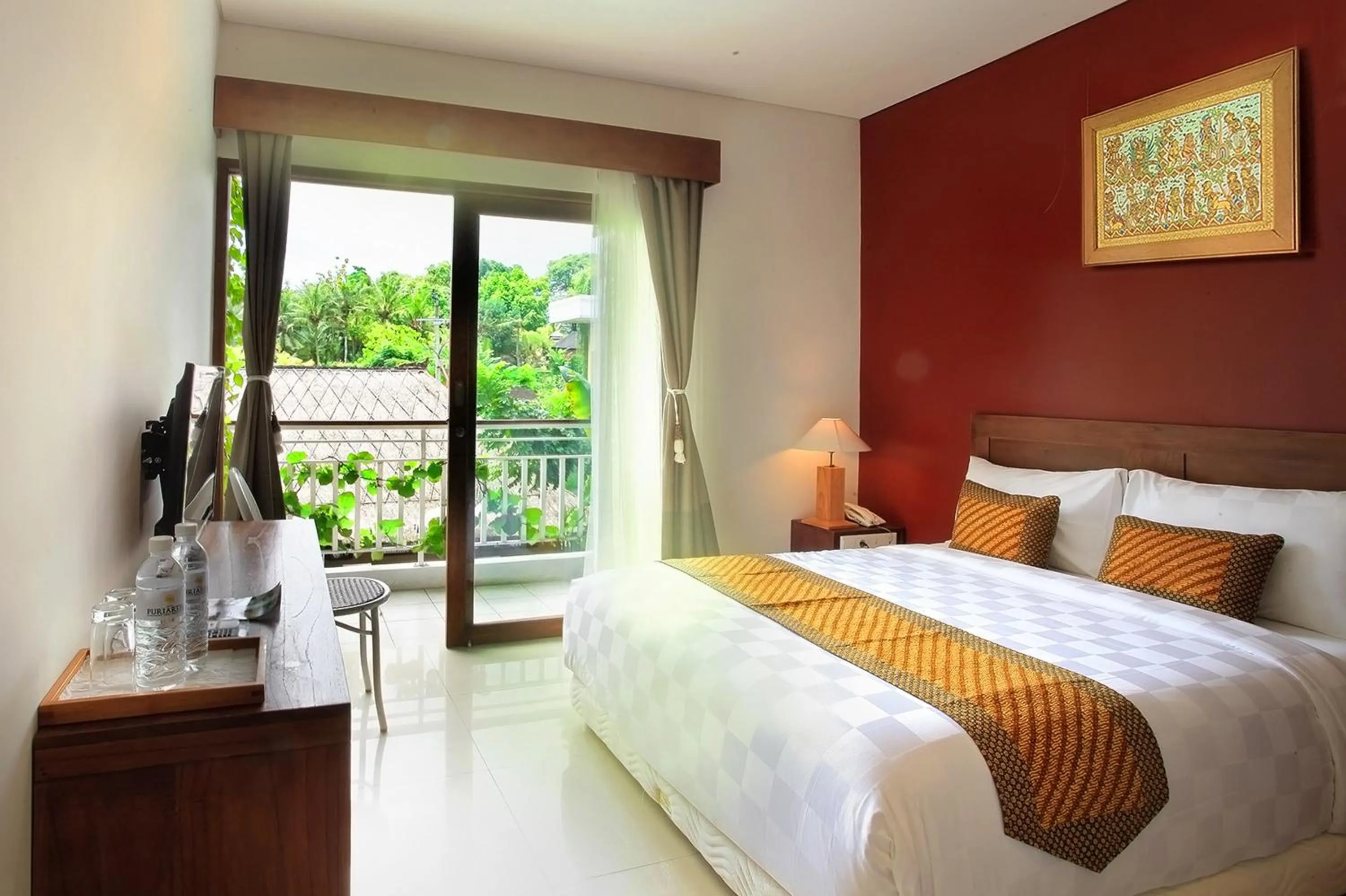 Bed in Hotel Puriartha Ubud