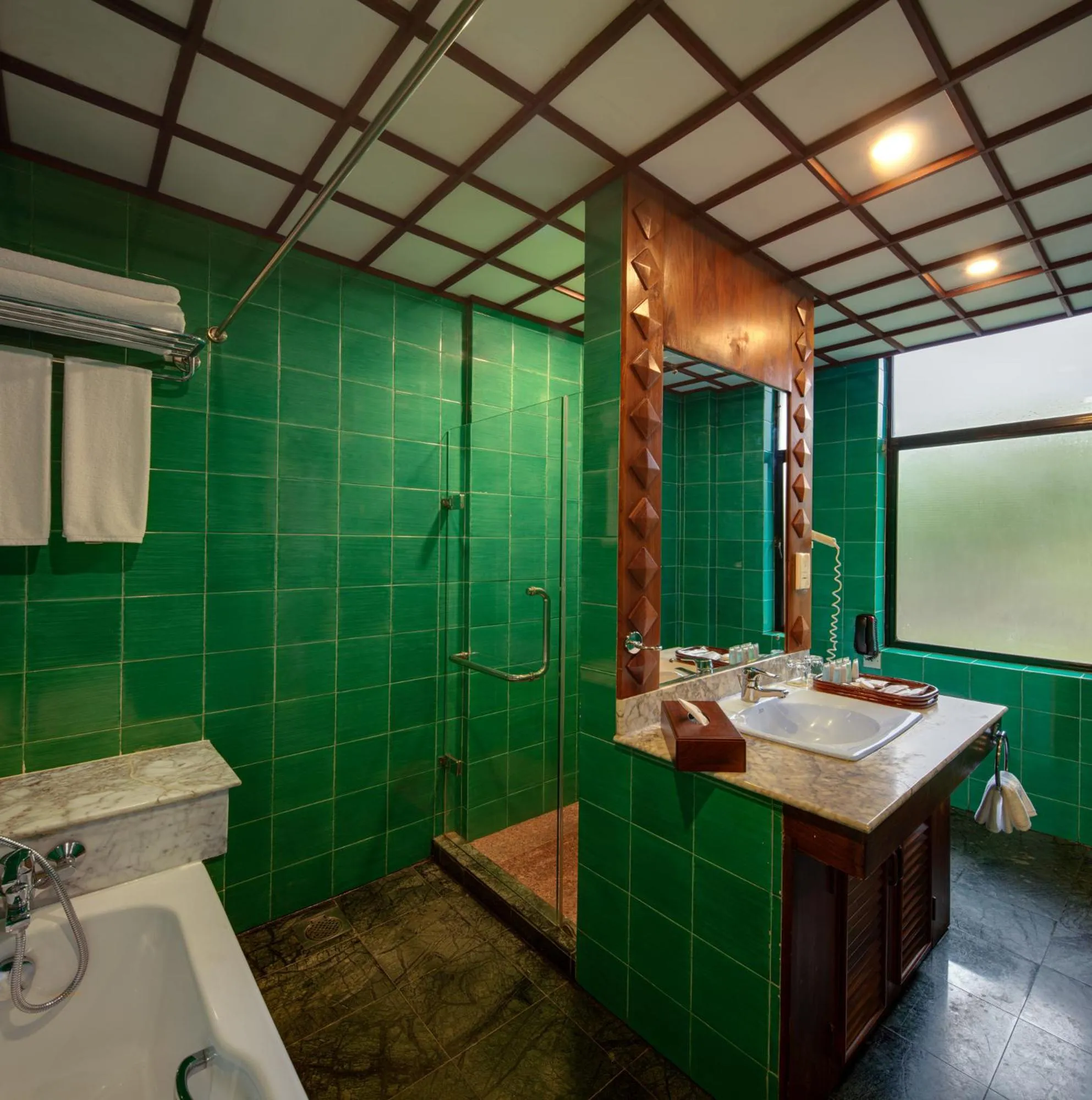 Bathroom in Earl's Regency Hotel