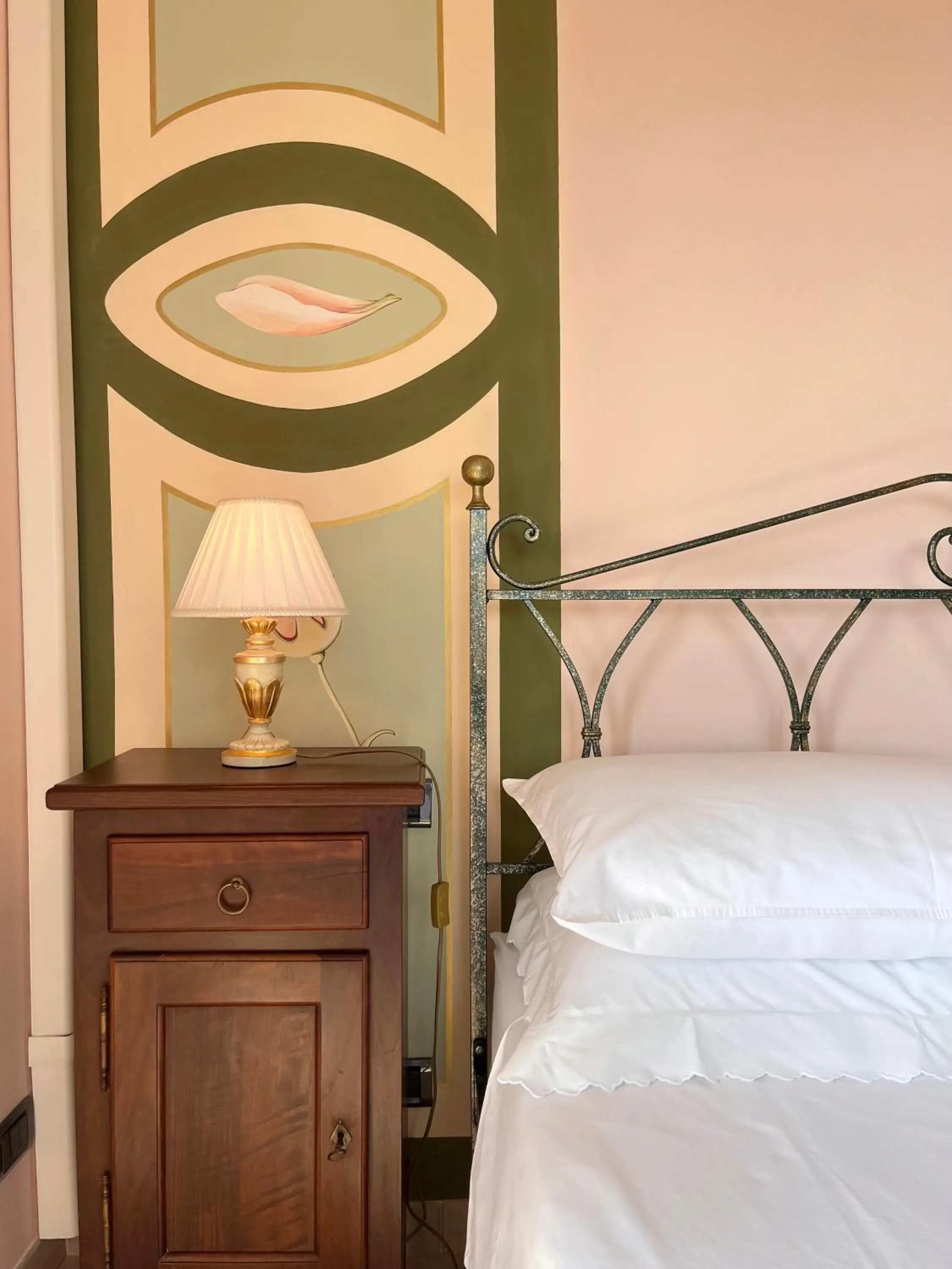 Decorative detail, Bed in Belvedere Bike Hotel