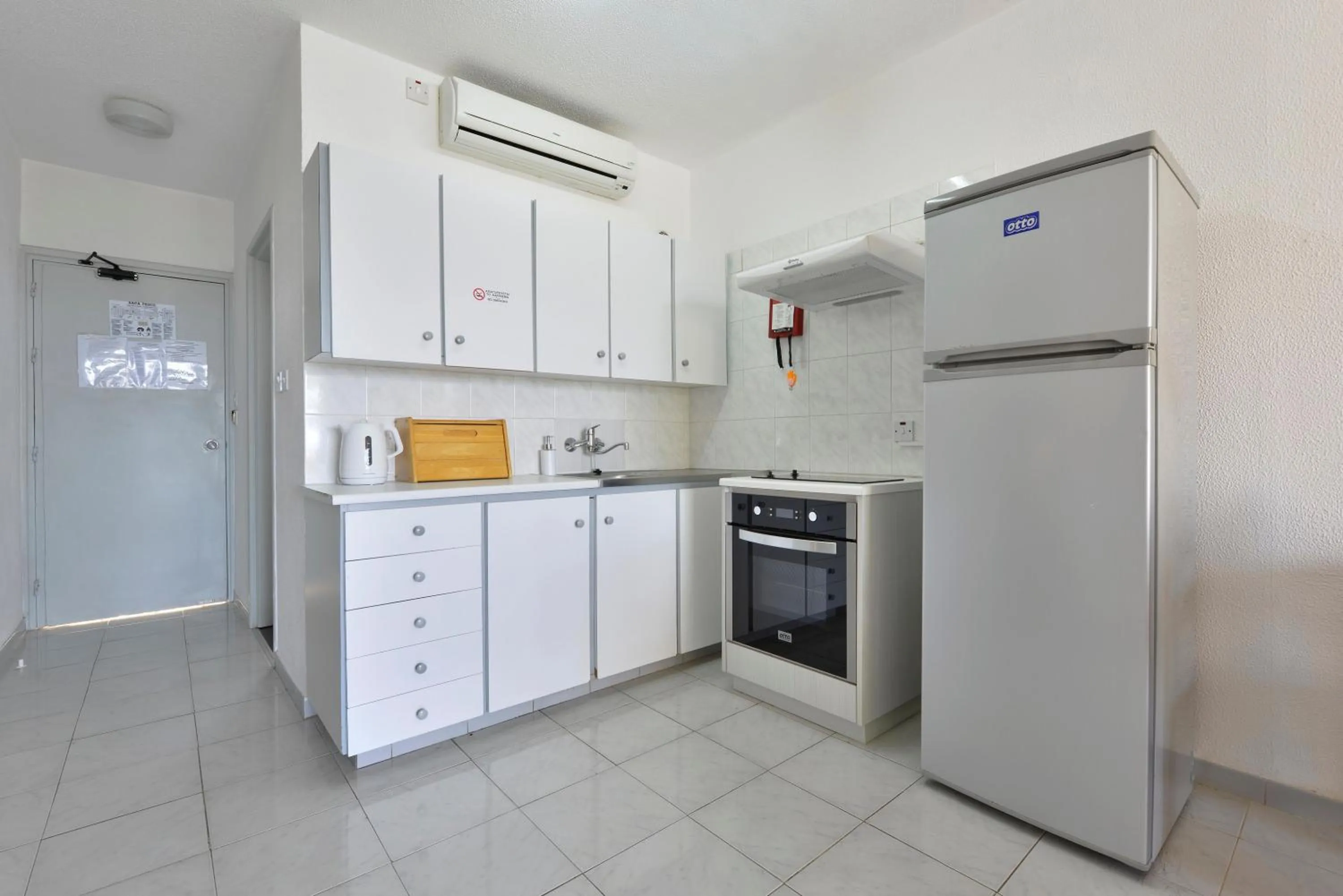 Kitchen or kitchenette in Napa Prince Hotel Apts