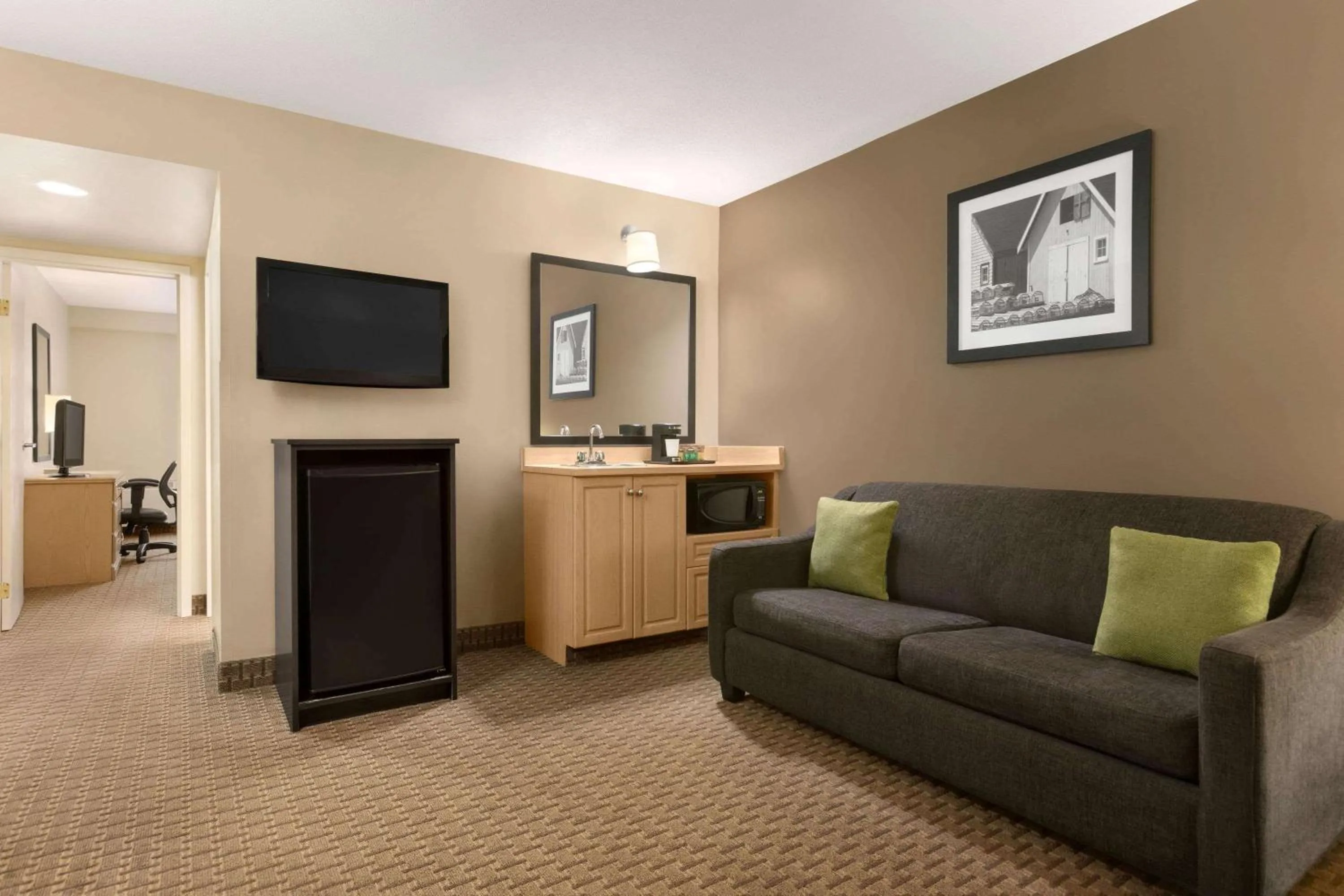 Photo of the whole room in Travelodge Suites by Wyndham Moncton