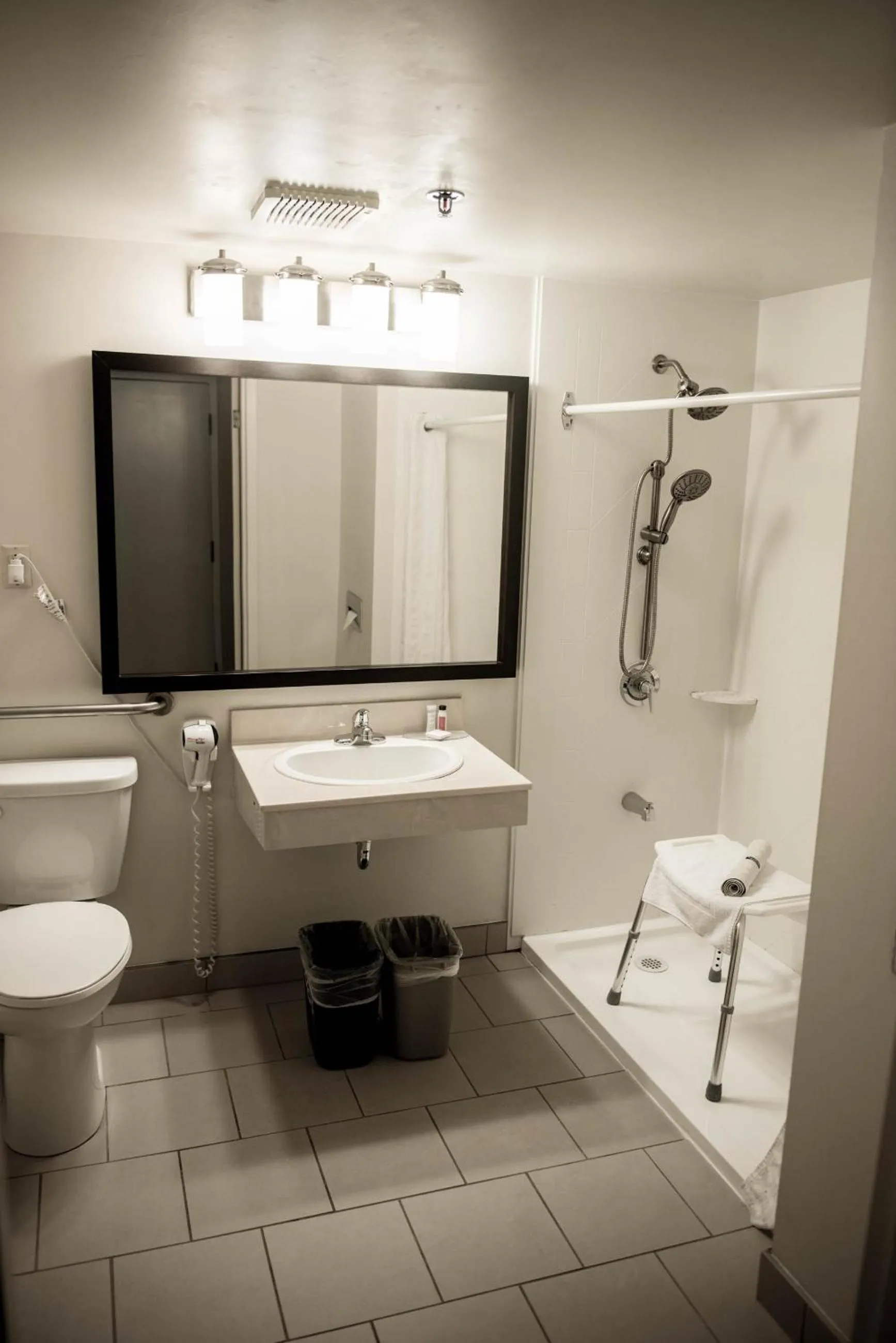 Shower in Travelodge Suites by Wyndham Moncton