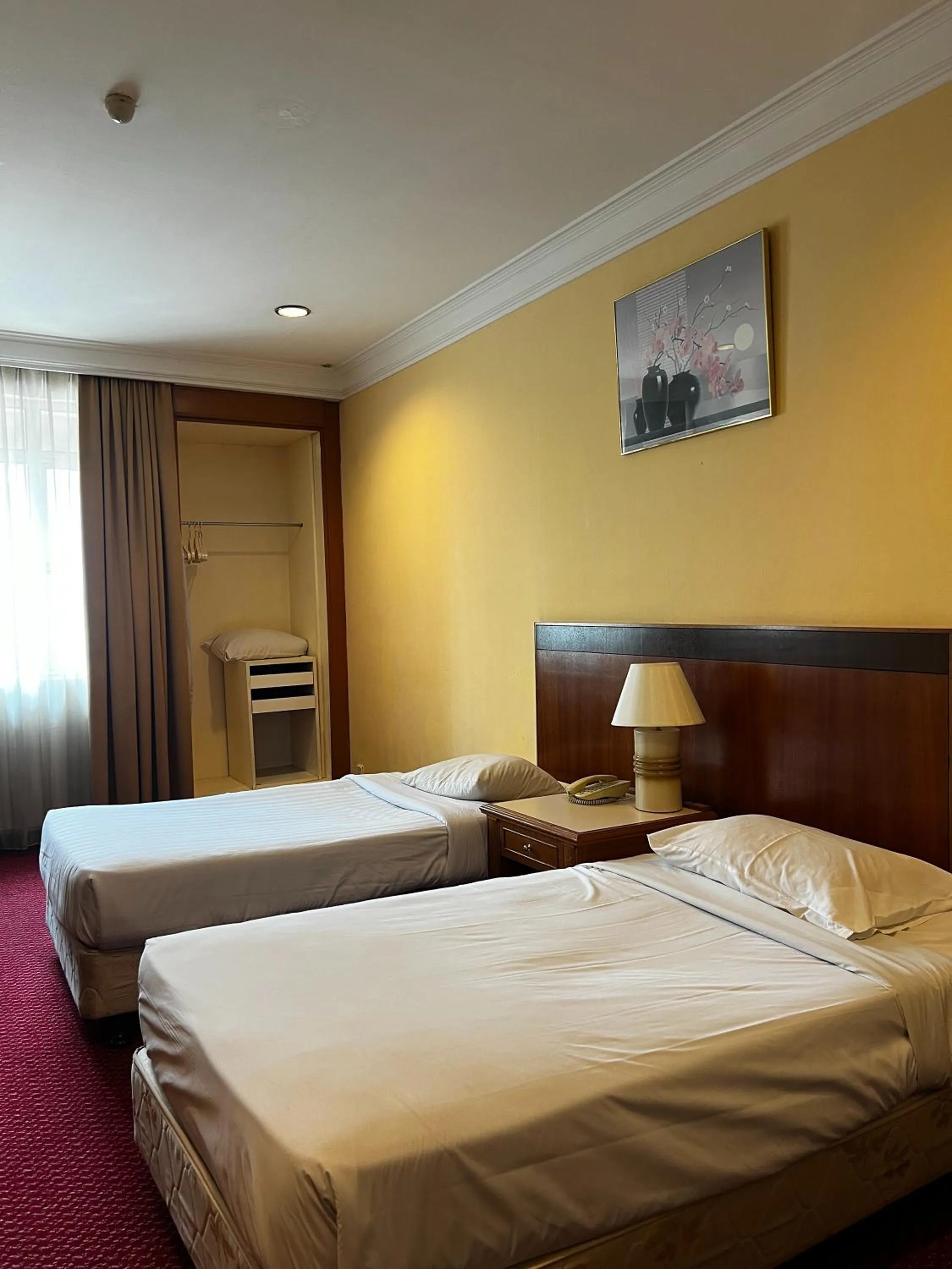 Bed in Grand Pacific Hotel PWTC