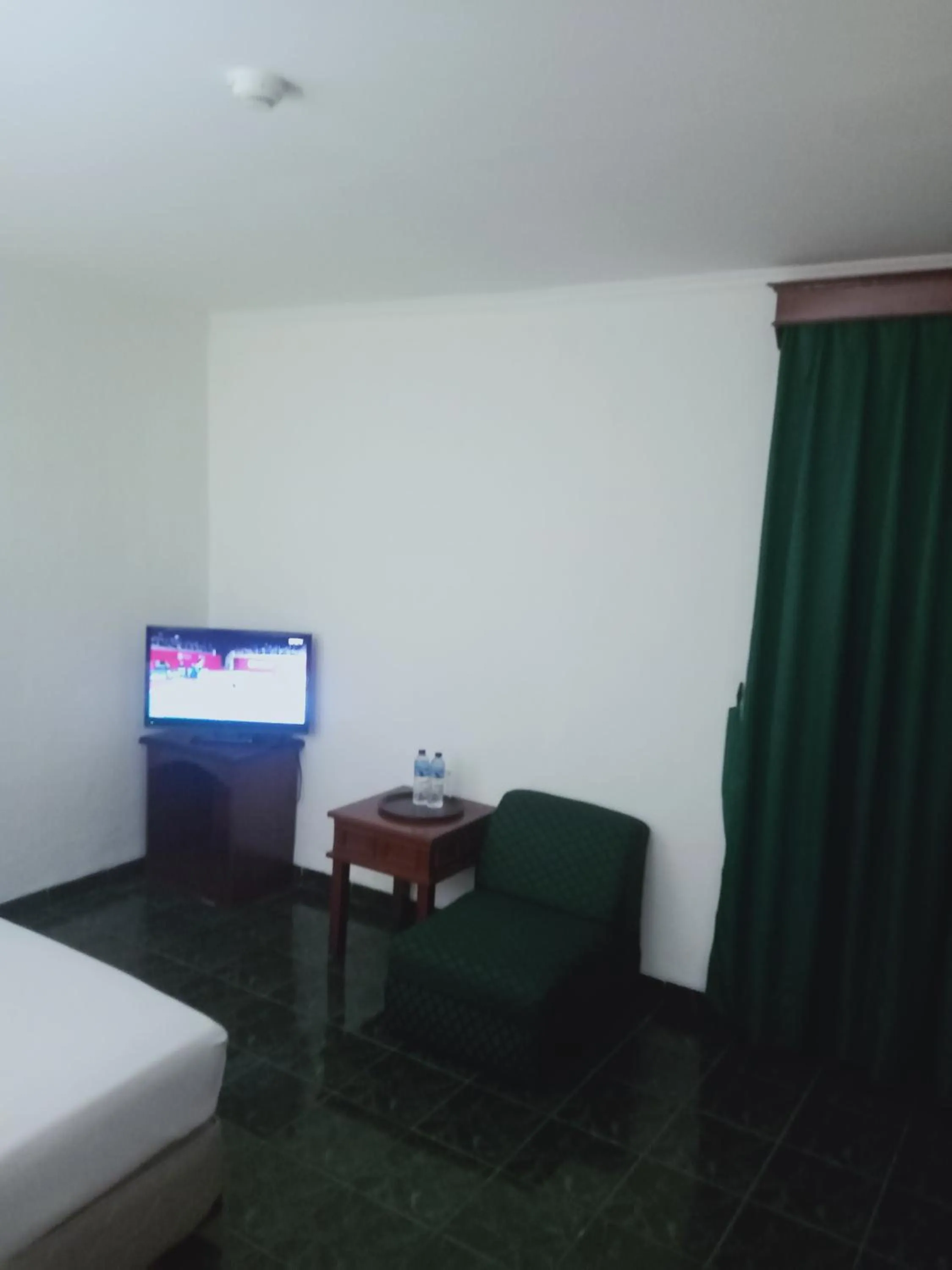 Bedroom in Puri Mega Hotel