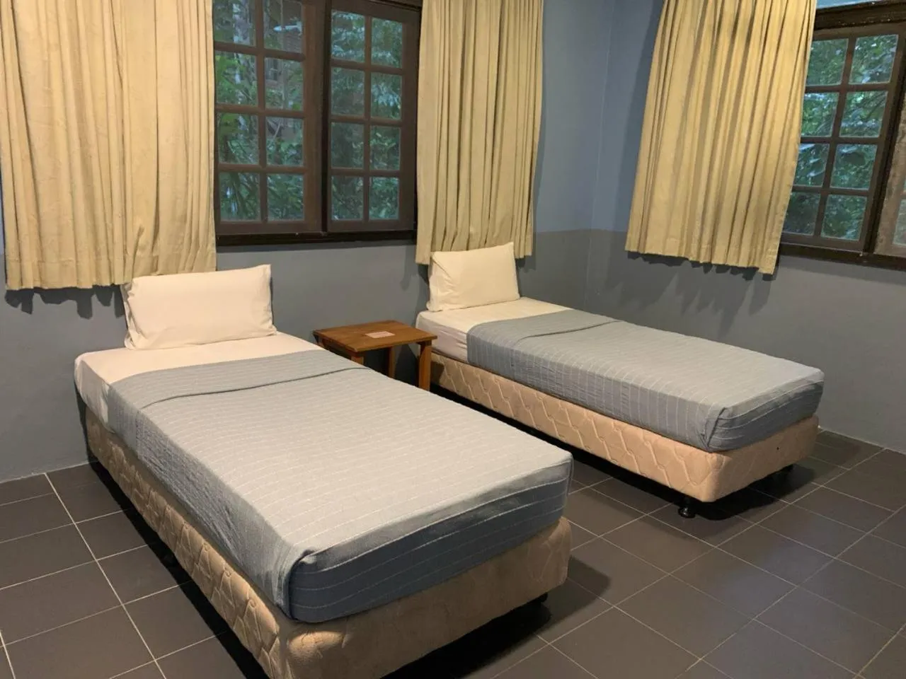 Bed in Permai Rainforest Resort