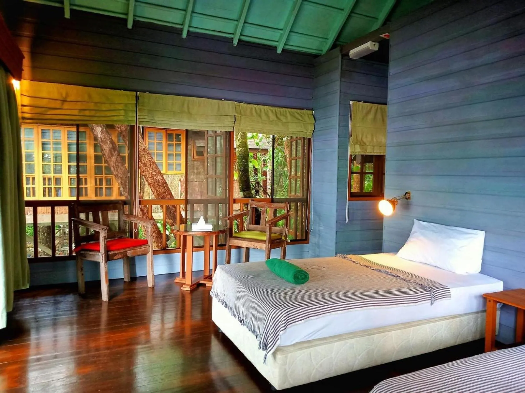 Bed in Permai Rainforest Resort