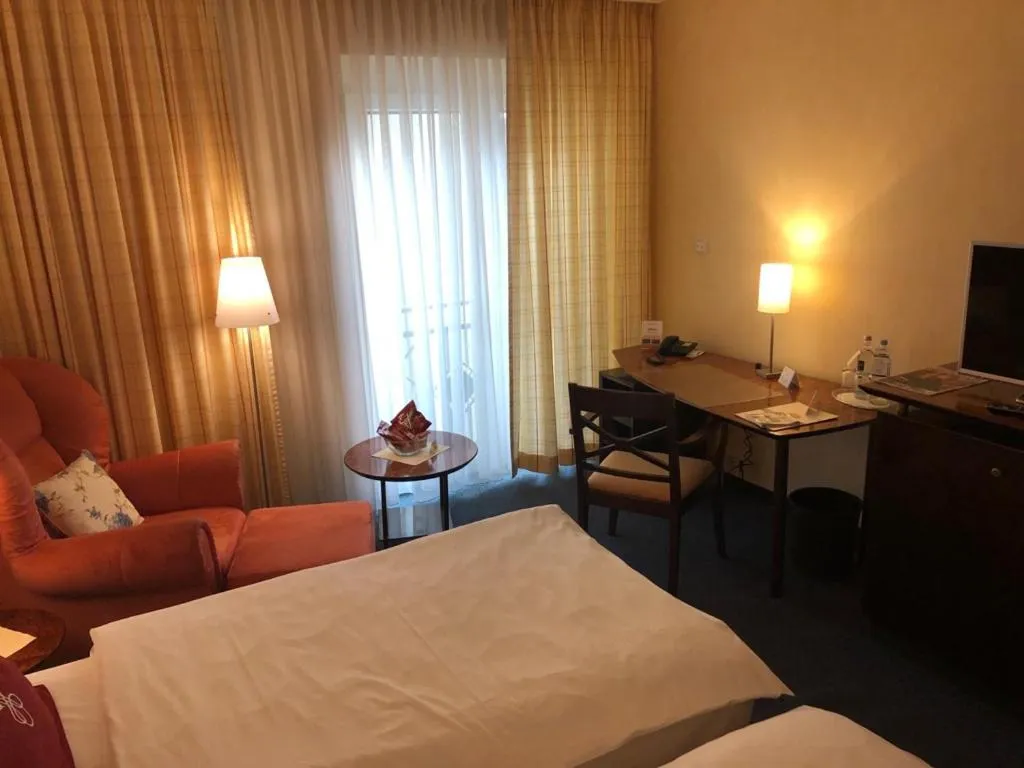 Photo of the whole room, Bed in Akzent Hotel Höltje