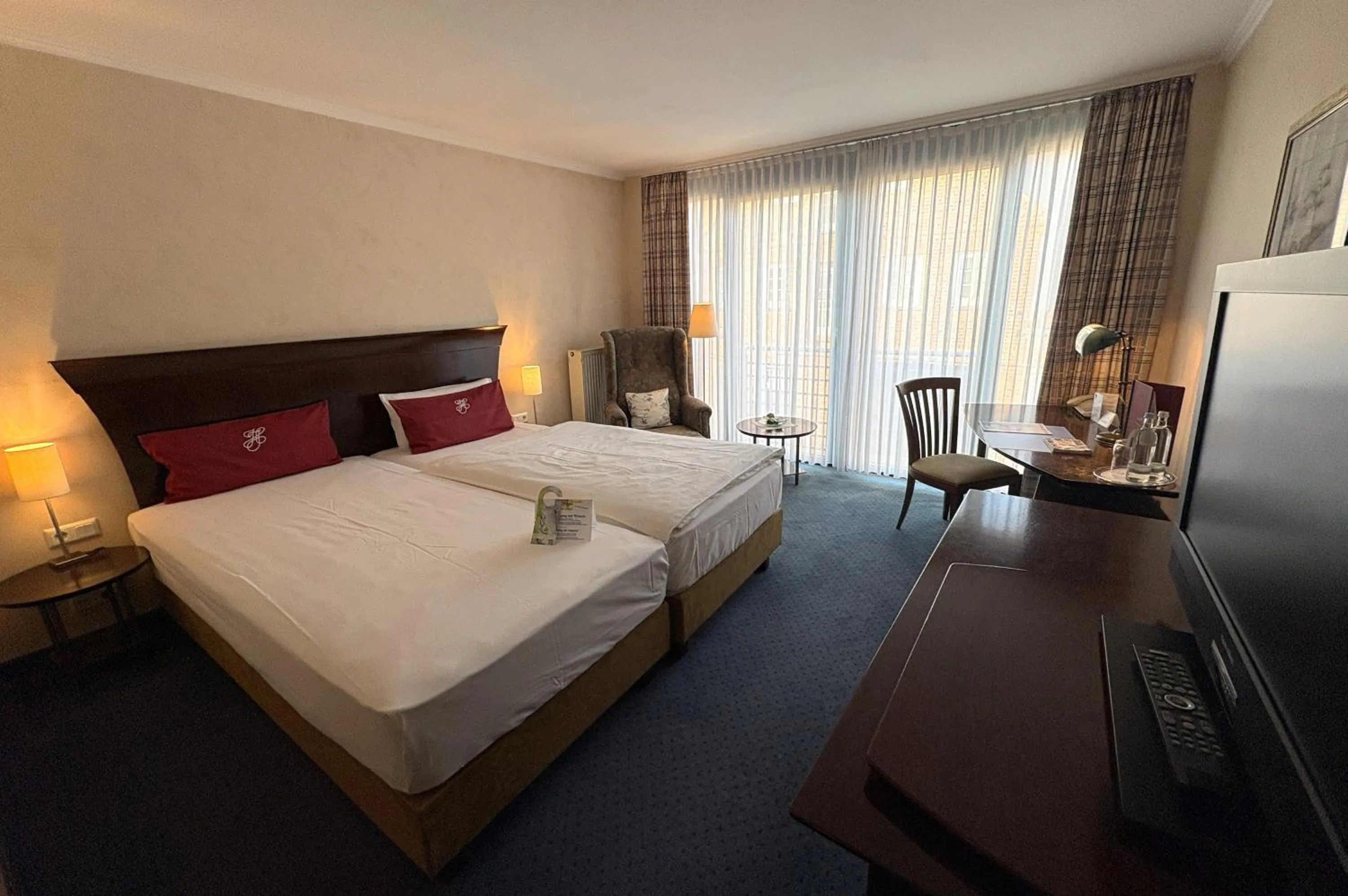 Photo of the whole room, Bed in Akzent Hotel Höltje