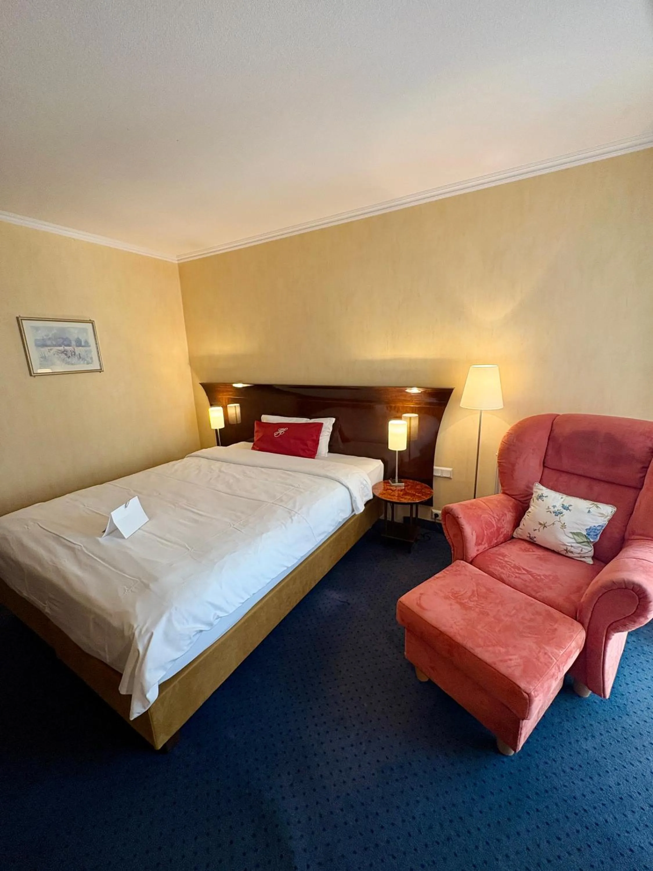 Photo of the whole room, Bed in Akzent Hotel Höltje