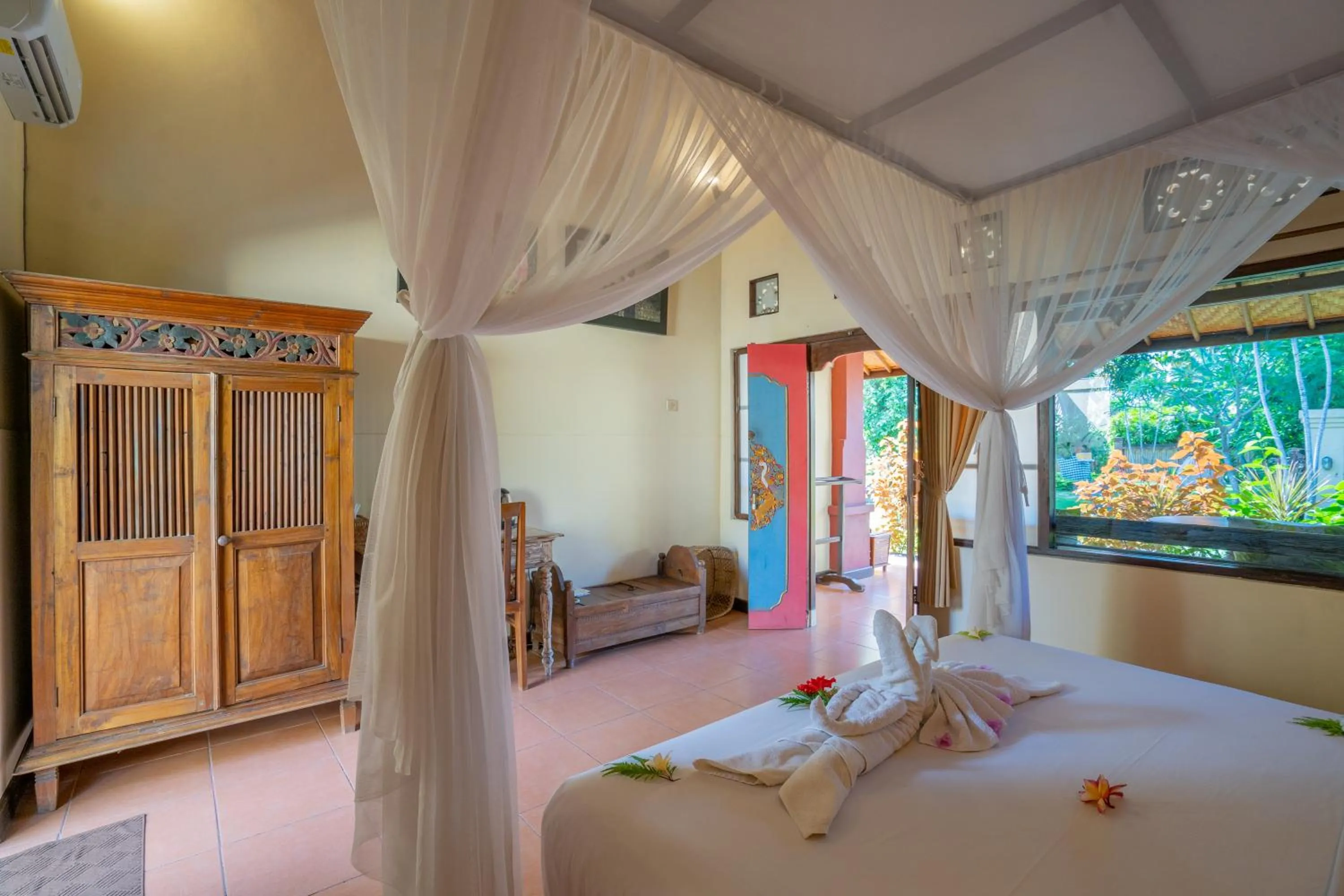 Bathroom, Bed in Taman Sari Bali Resort and Spa