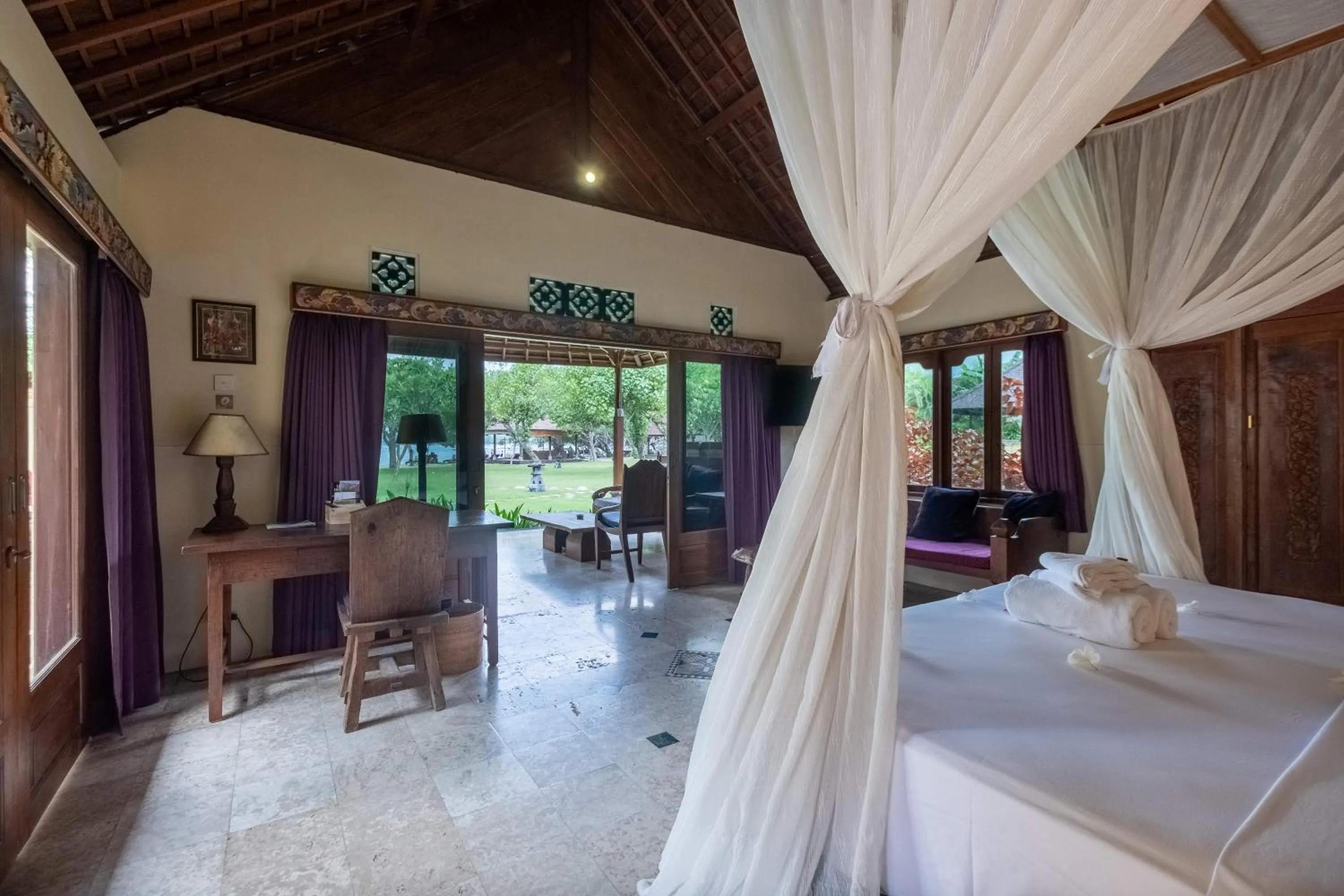 Bed in Taman Sari Bali Resort and Spa