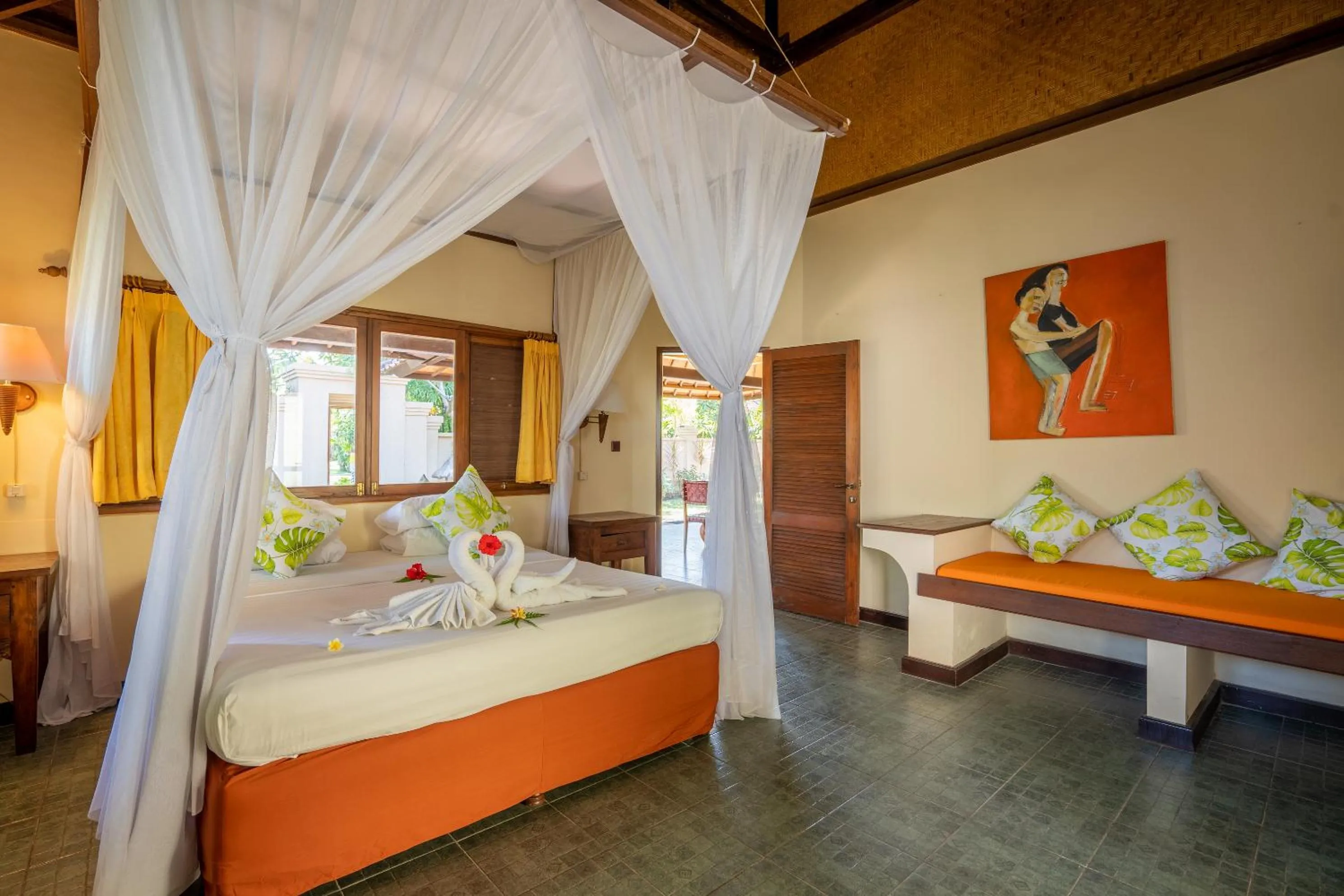 Bed in Taman Sari Bali Resort and Spa